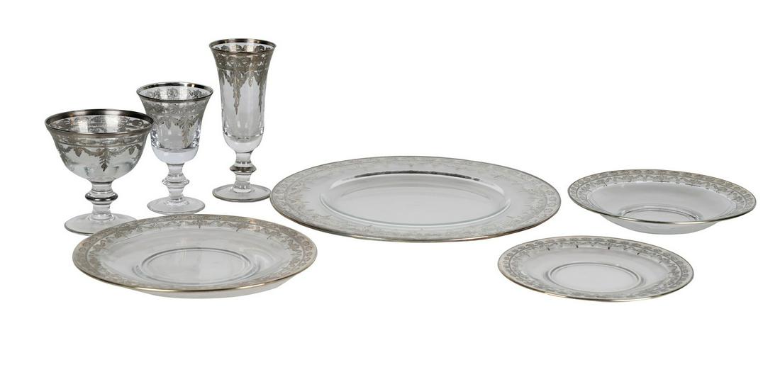 ARTE ITALICA SERVICE FOR EIGHT: Vetro Silver pattern comprising 8 coupes, 7 goblets, 8 tall goblets, 8 soup plates, 8 underplates, 8 dinner plates and 8 chargers Condition: missing one wine glass. the chargers: 13 1/2 inches diamete