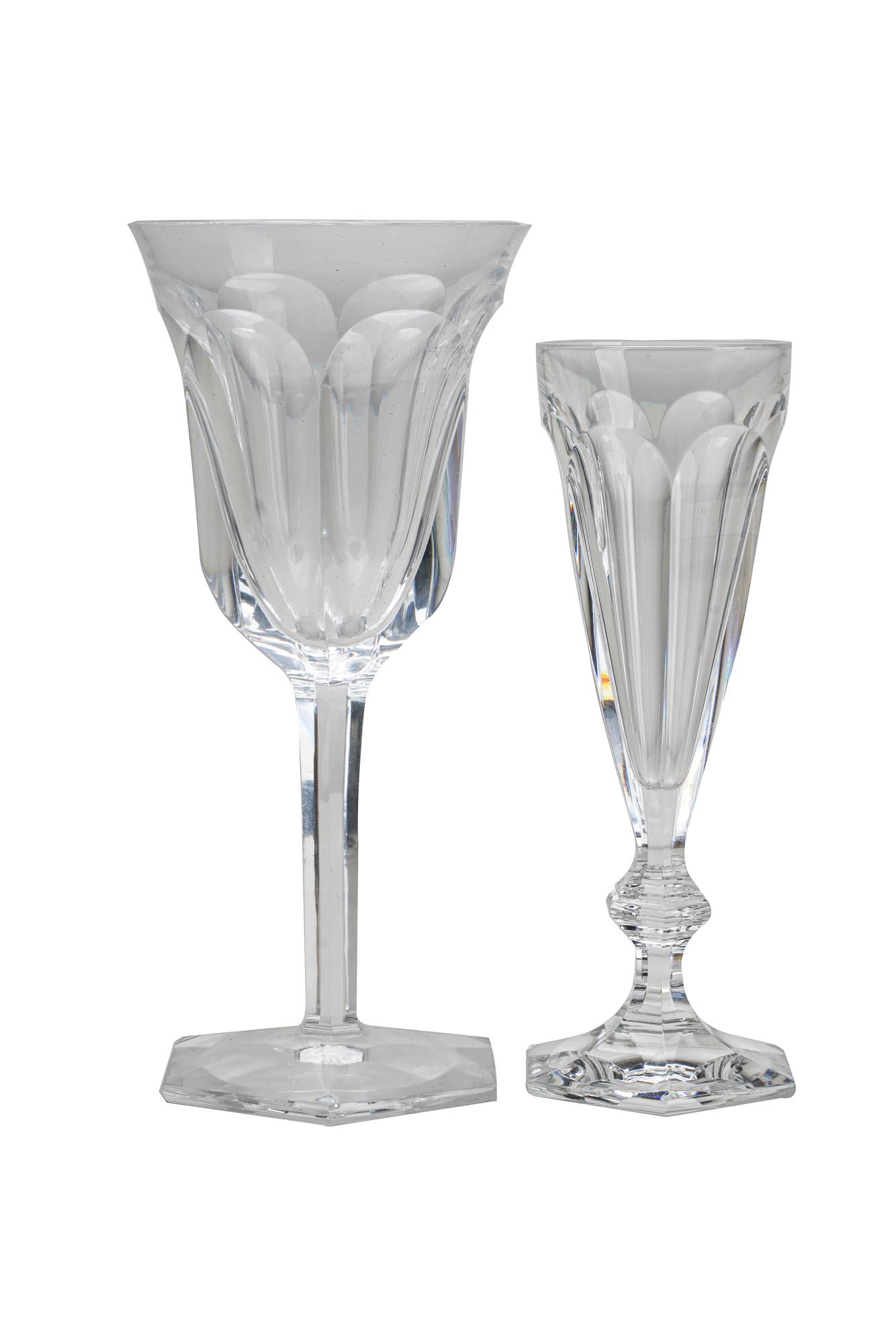 COLLECTION OF BACCARAT CRYSTAL DRINKWARE: each with "Baccarat France" mark, comprising five "Malmaison" water goblets (8 1/8"), one "Malmaison" wine (7 7/8"), six "Harcourt" champagne flutes (7"), six "Harcourt" highballs (5 1/2"), four "Harc