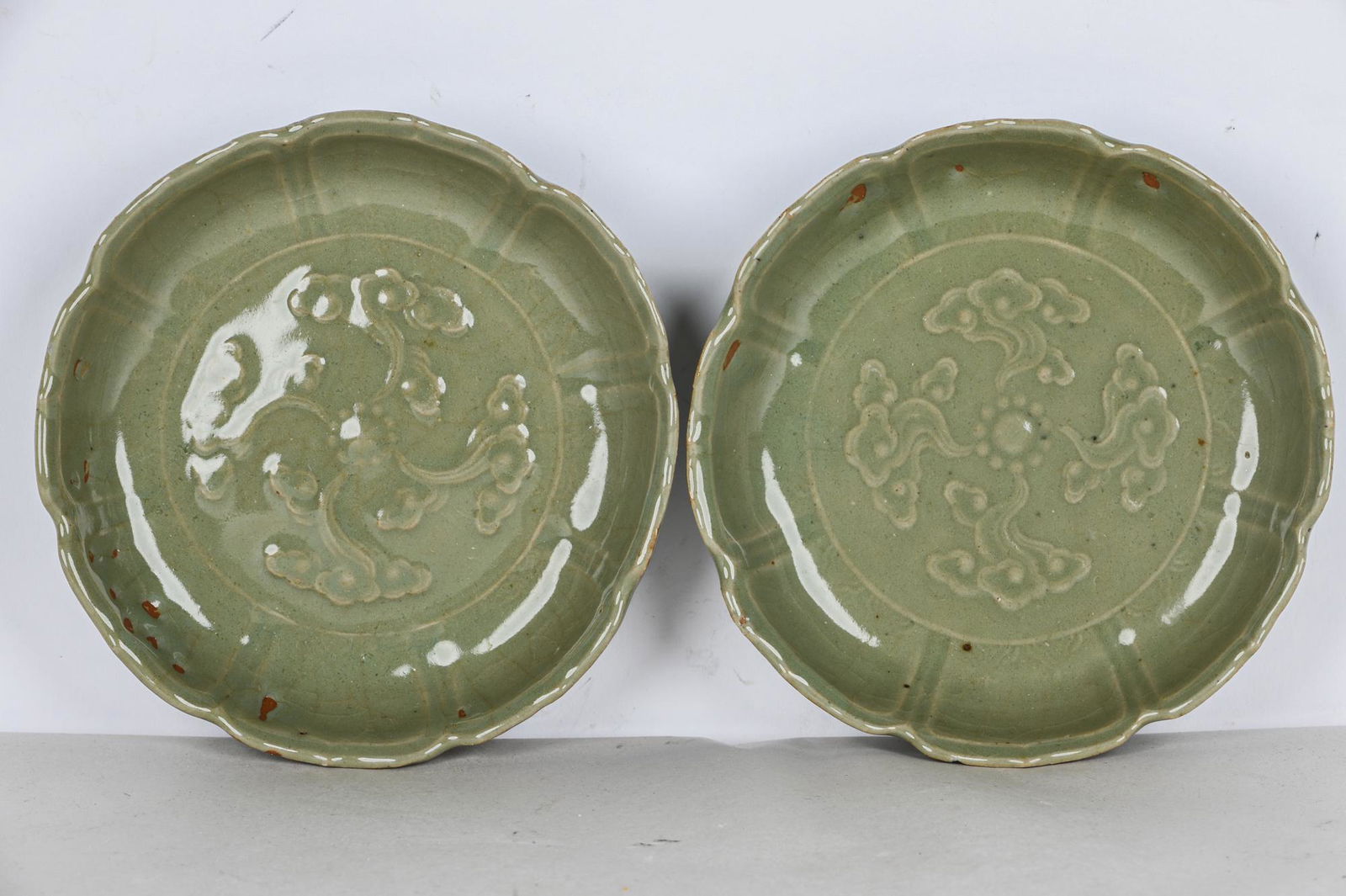 PAIR OF INCISED CELADON GLAZED DISHES (1 of 5)