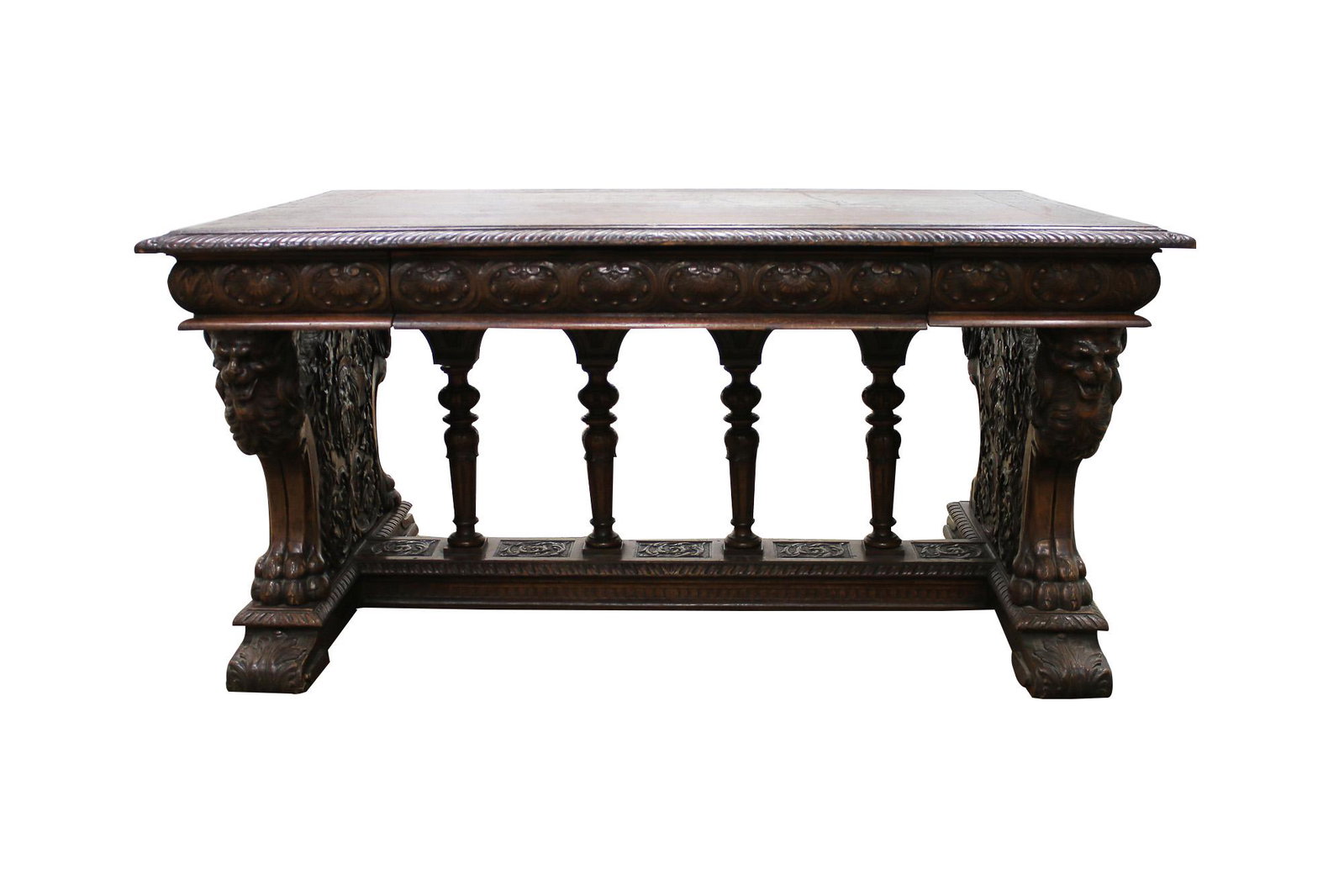 ITALIAN RENAISSANCE REVIVAL CARVED WALNUT LIBRARY TABLE: 59 1/2 inches wide; 40 inches deep; 29 inches high