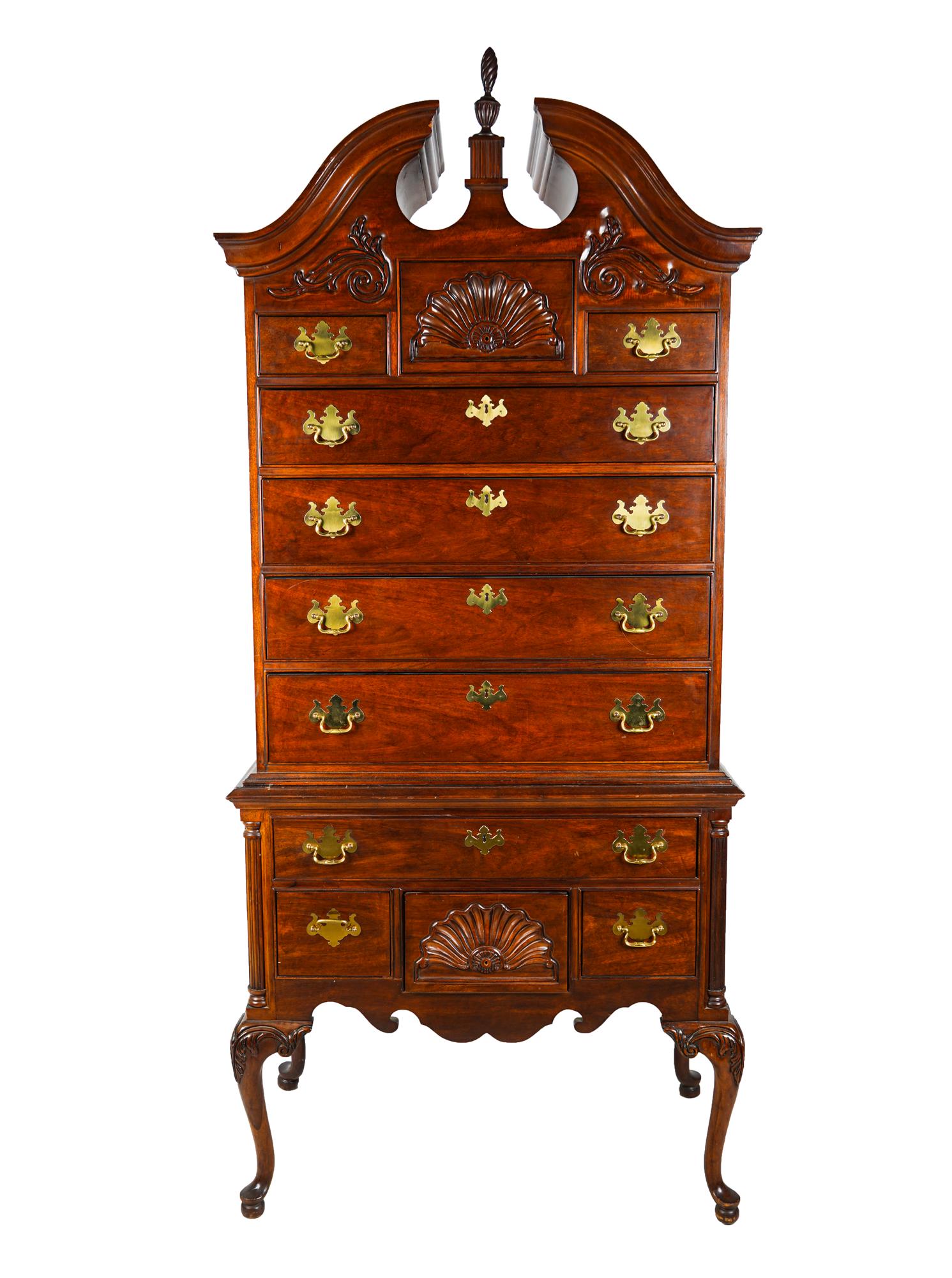 MAHOGANY TWO-PART HIGH BOY: 20th Century in the Georgian style Condition: slight nicks to top crown 37 1/4 inches wide; 19 inches deep; 84 inches high