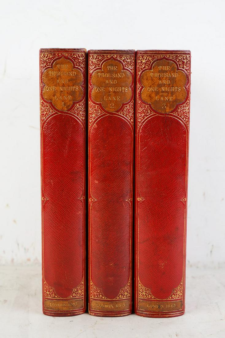 THREE VOLUMES: "THE THOUSAND & ONE NIGHTS": Lane, Edward William, translator "The Thousand and One Nights, Commonly Called, In England, The Arabian Nights' Entertainments" London: Routledge, Warne and Routledge, 1865 [3 volumes] Condition: with