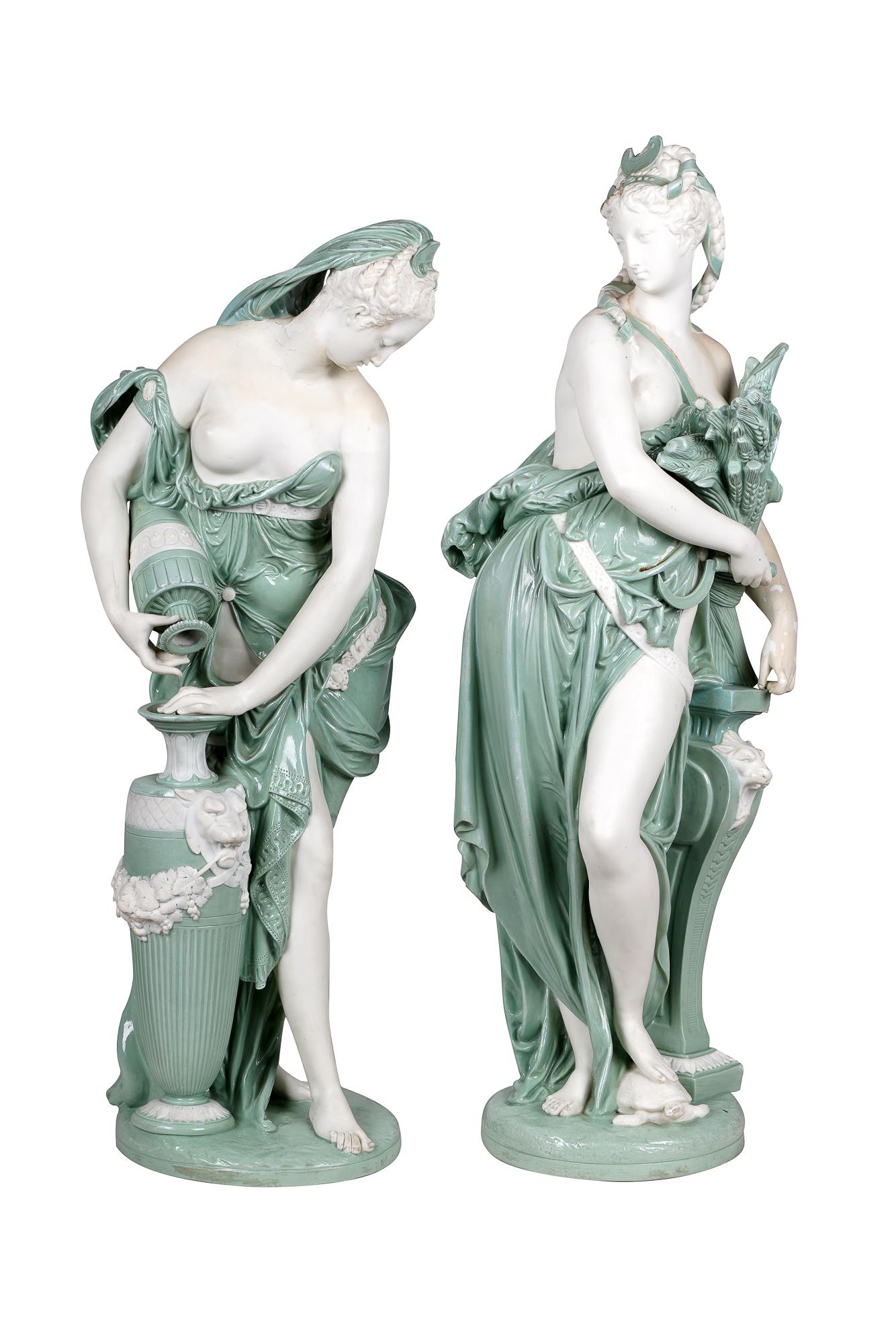 PAIR OF MINTONS STYLE NEOCLASSIC PORCELAIN FIGURES OF: Condition: with discoloration and loss to glaze on each figure; one with evidence of repair to shoulder; in need of a cleaning Provenance: The Estate of Barron Hilton 28 1/2 inches high