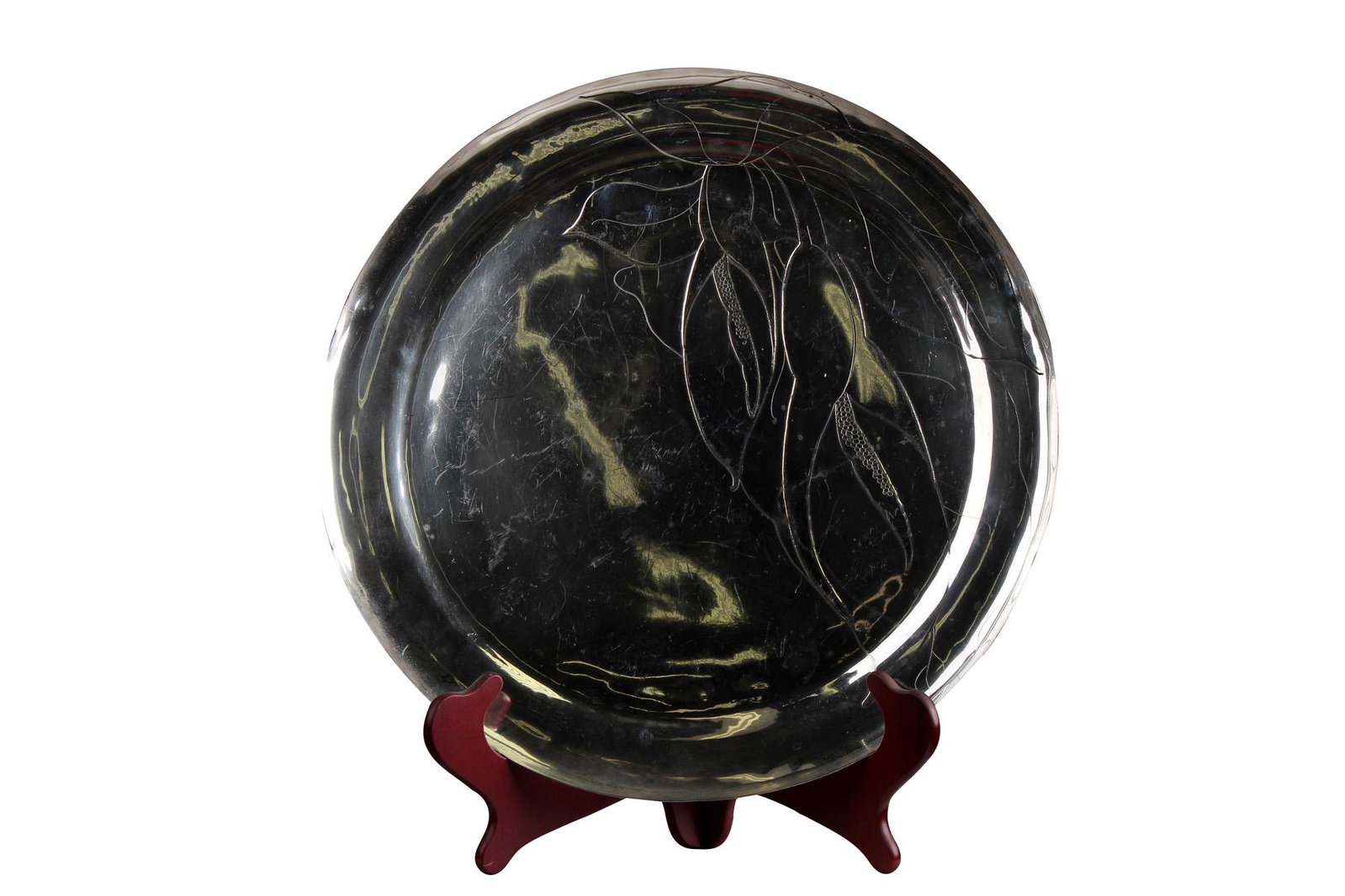 SILVERPLATE TRAY: marked "M. Fleming" and "Grossman Moody Hawaii", with tropical foliage design Condition: with surface scratches and discoloration spots throughout 17 1/2 inches diameter