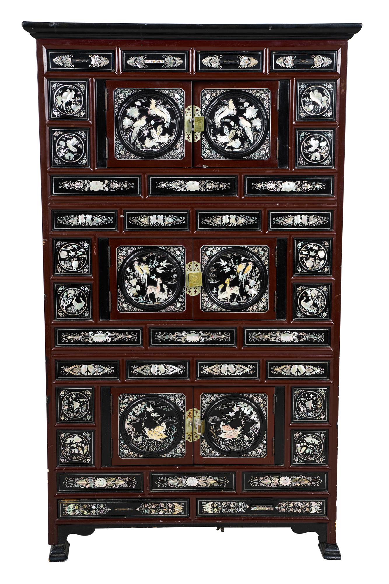 ASIAN MOTHER OF PEARL-INLAID CABINET: late 20th Century Condition: loss to multiple pulls; surface scratches, nicks, and scuffs throughout 28 inches wide; 16 inches deep; 47 1/4 inches high