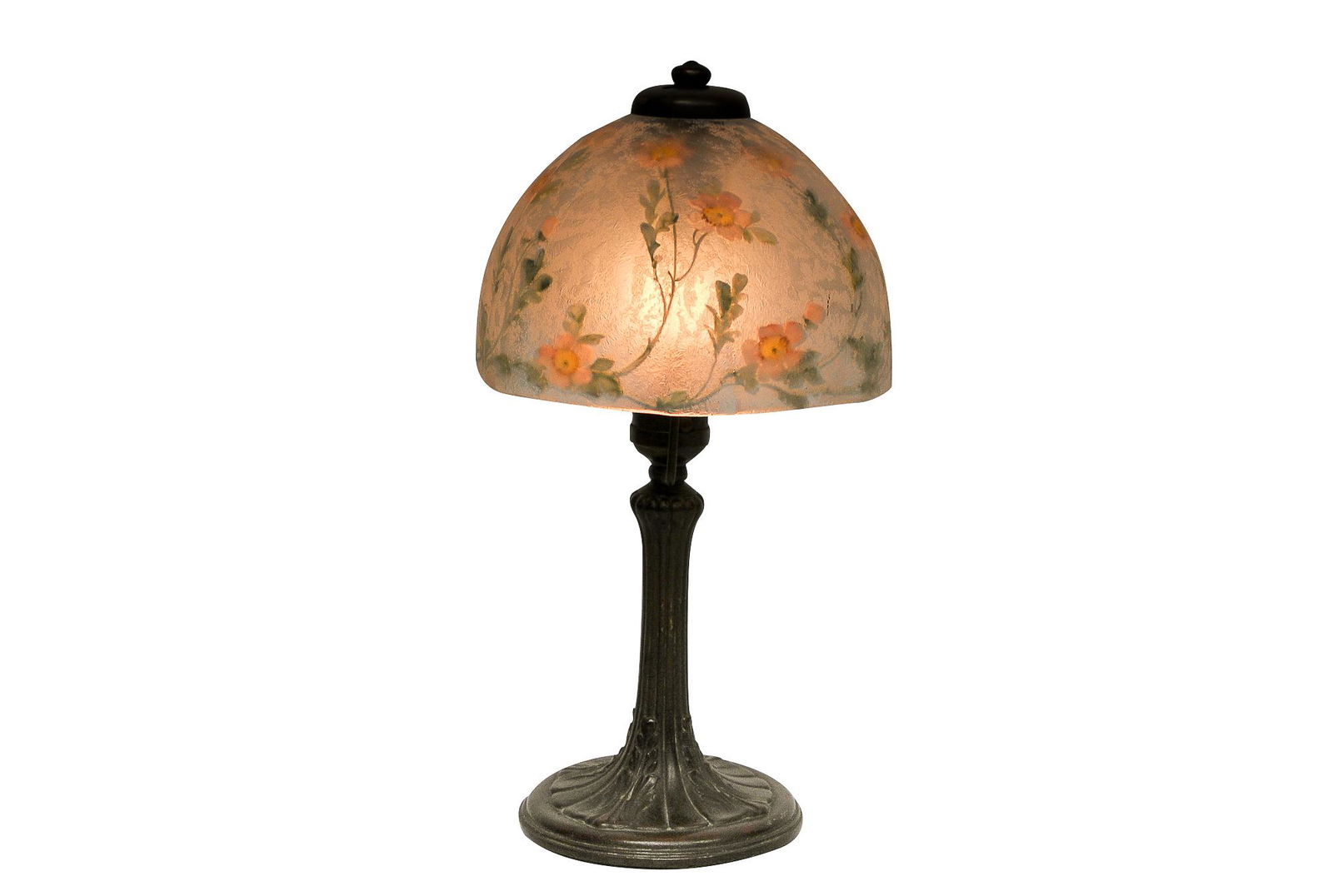 HANDEL FLORAL BOUDOIR LAMP PAINTED BY ROBERT GOODWIN: circa 1917 reverse painted "chipped ice" glass shade with a patinated metal reeded base shade depicting pink flowers shade signed HANDEL 6462 RG 12 3/4 total inches high; shade: 7 1/4 inches wide; 4 1