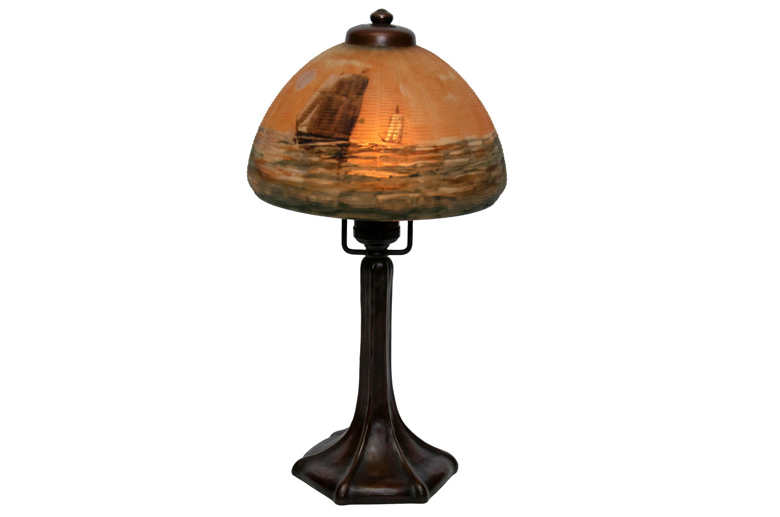 HANDEL SAILING SHIPS BOUDOIR LAMP: circa 1923 reverse painted basket weave glass shade with a bronze base shade depicting sailing ships and an oasis shade signed 7165 D underside base signed lower and with Handel Lamps label underside