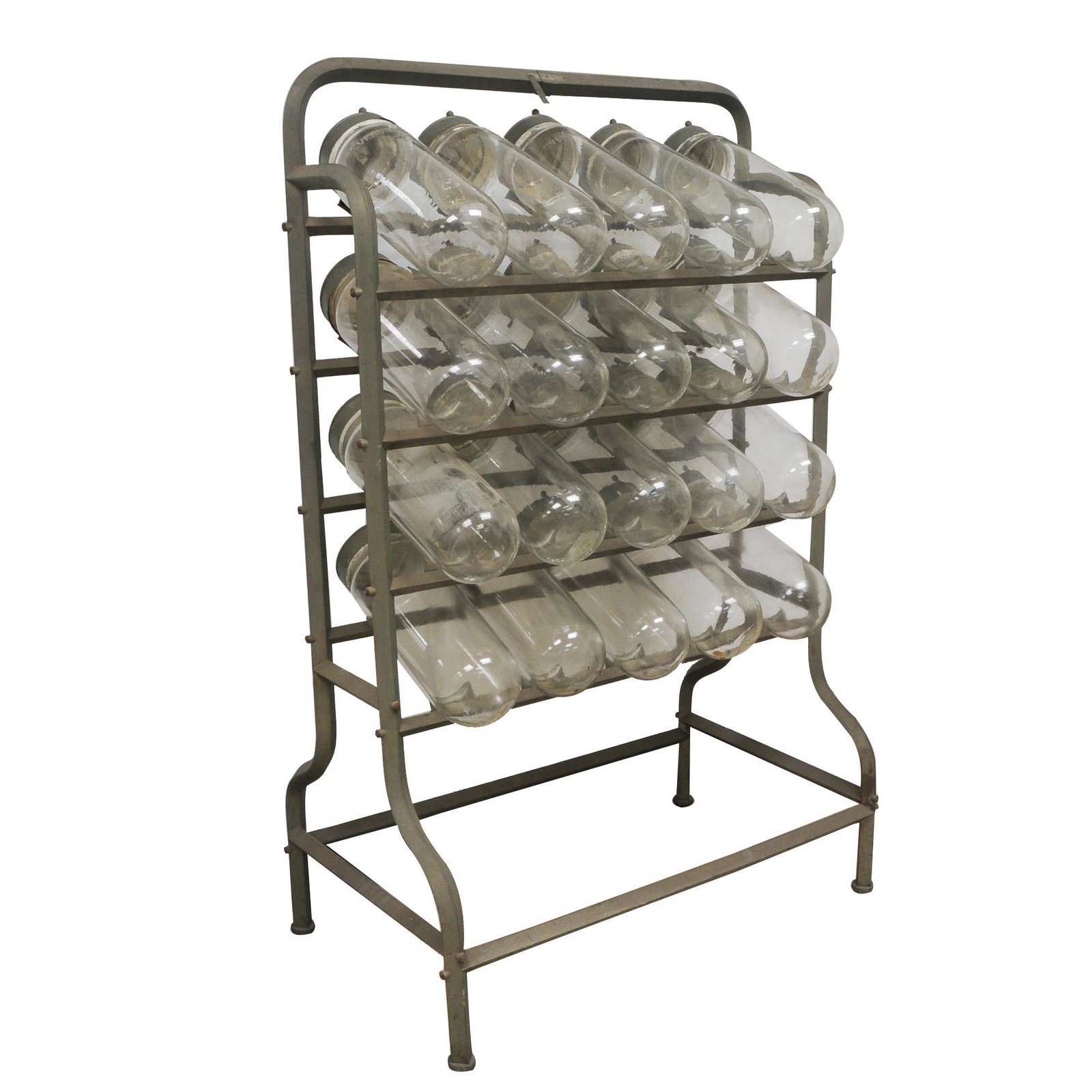 APOTHECARY RACK WITH "VENDOSOLO" BOTTLES: bottles etched "Vendosolo" Condition: with splitting to some bottle lids and to metal base of rack; five bottles without decoration the rack: 35 inches wide; 21 inches deep; 55 inches high; each bottl