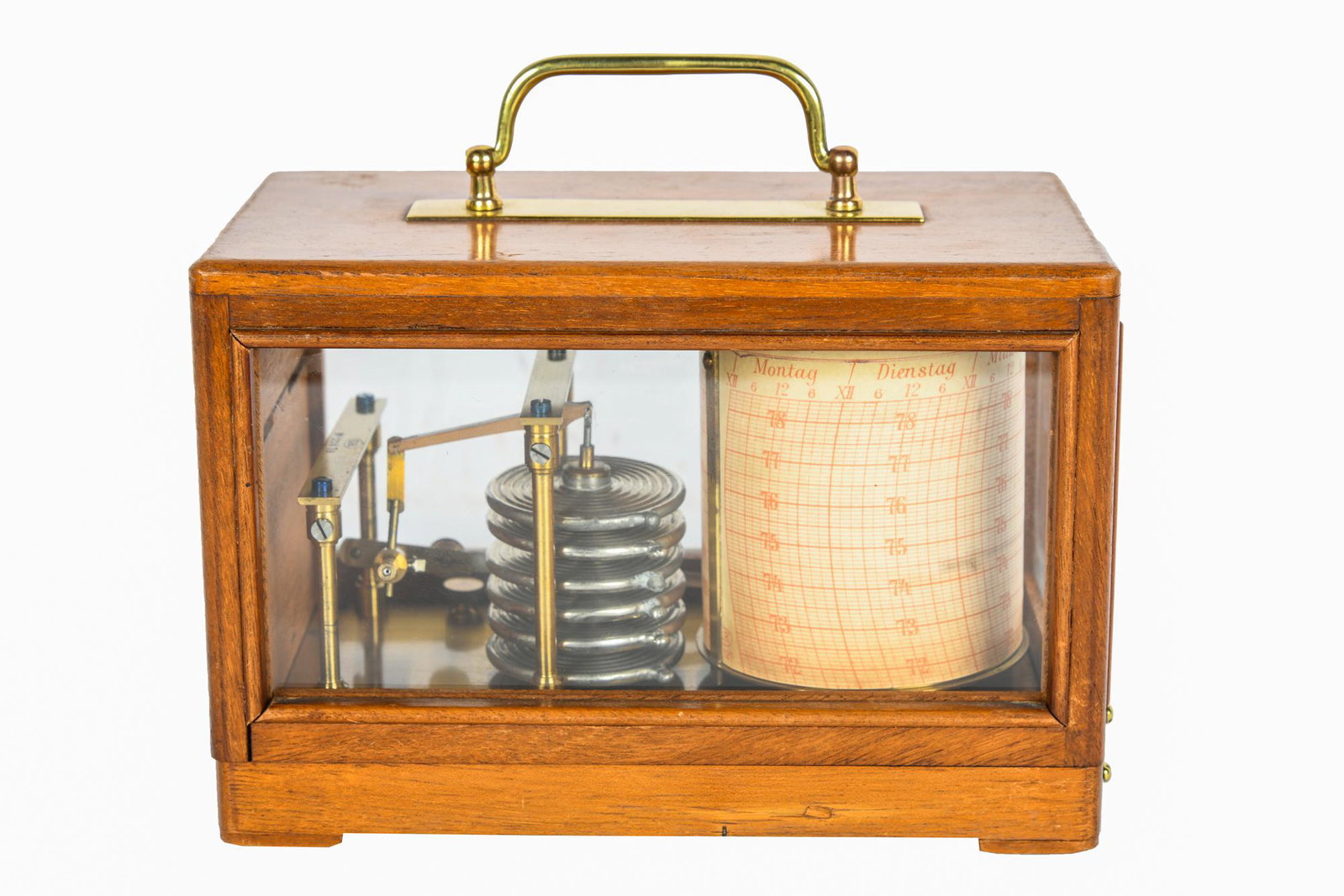 OTTO BOHNE GERMAN ANEROID BAROGRAPH: circa 1925 marked "O.B.", serial number 22479 lacquered brass and metal, with vacuum, clock movement, winding key and paper strip mounted with the days of the week in German, mounted in a hinged, glaz