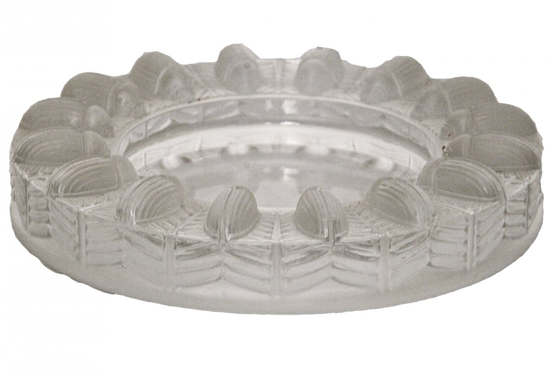 RENE LALIQUE TOBAGO ASHTRAY: circa 1960 clear and frosted glass with repeating beetle motif on elevated rim 5 1/2 inches diameter; 1 inch high