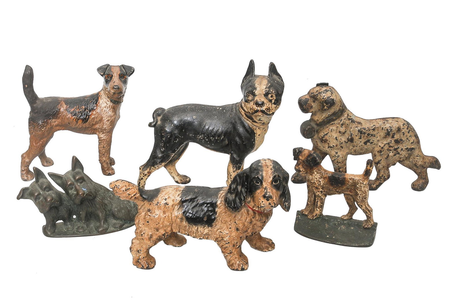 GROUP OF SIX DOG DOOR STOPS: circa 1900-1950 painted cast iron Condition: with loss to paint throughout ranging from 10 to 5 1/2 inches high
