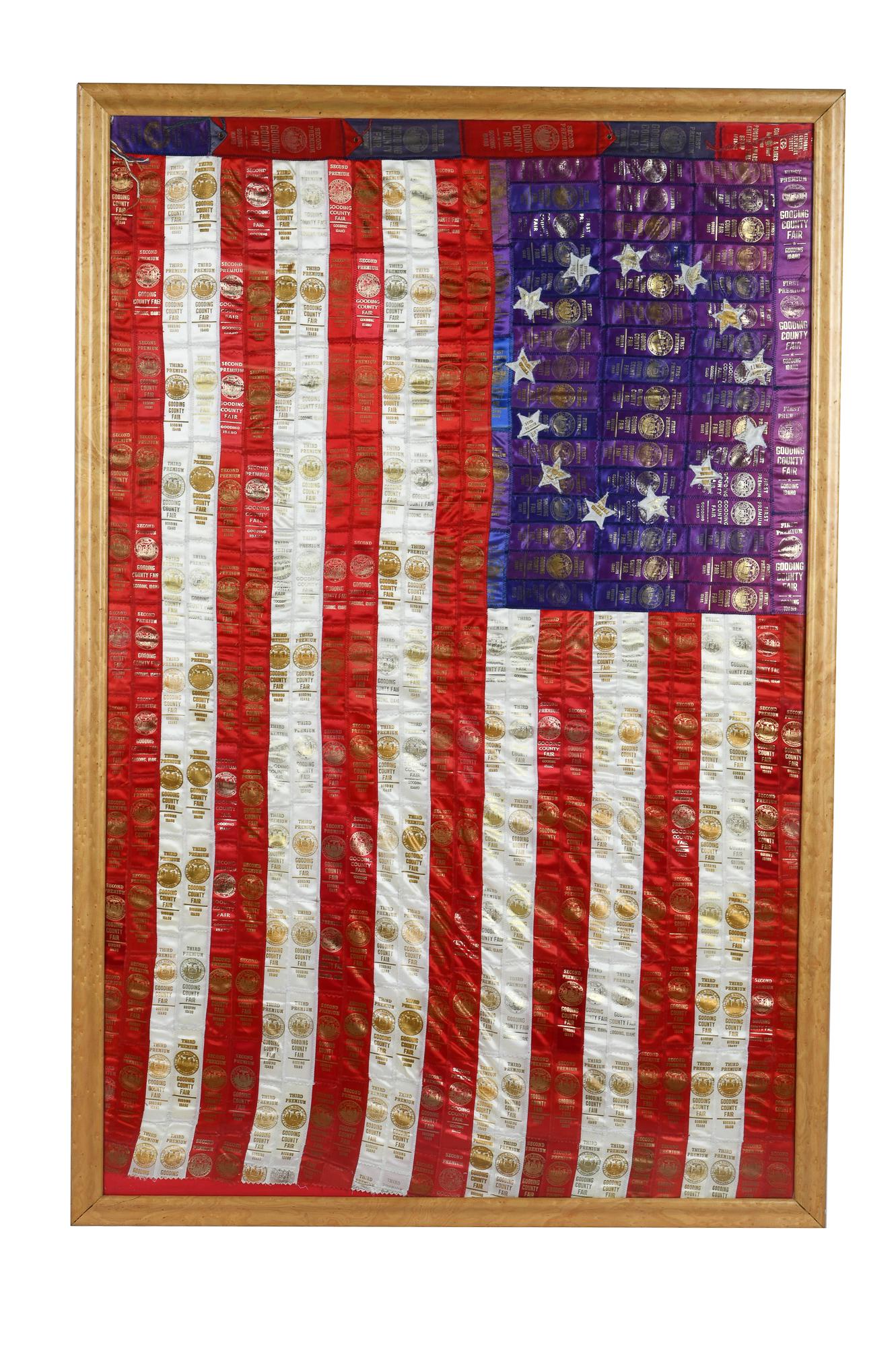 LAURA FISHER: U.S. FLAG COUNTY FAIR RIBBON COLLAGE: circa 1994 in custom birdseye maple frame 35 x 55 inches