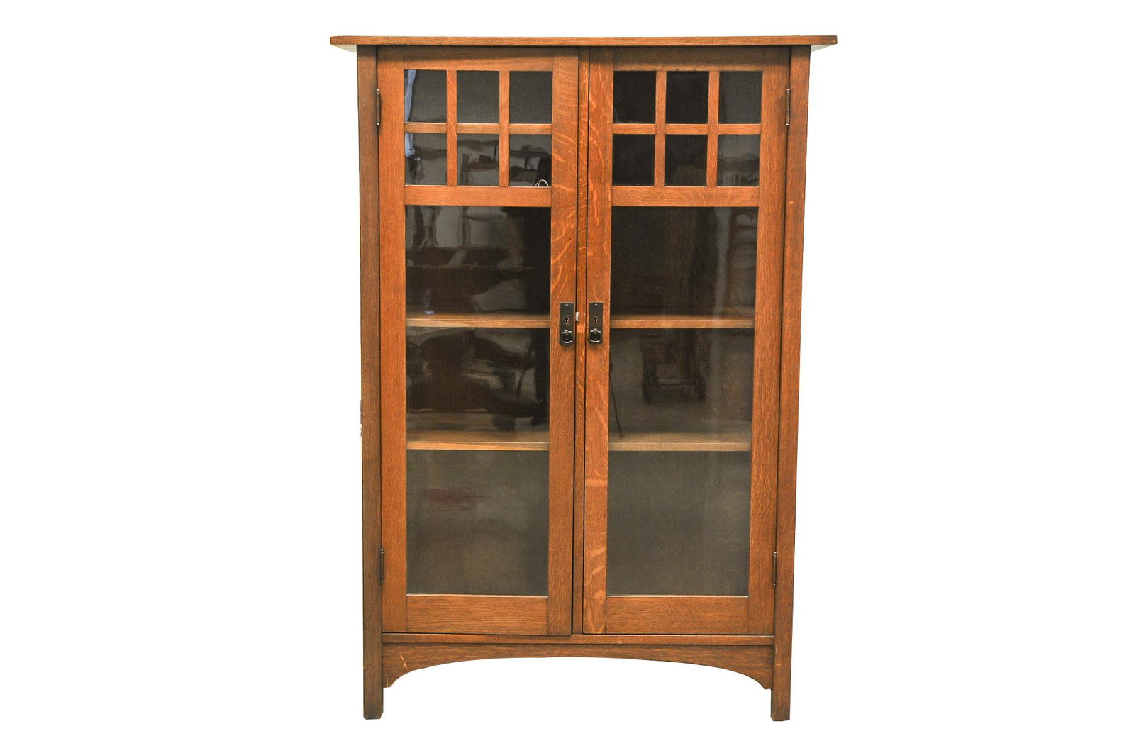 L & J.G. STICKLEY OAK CHINA CABINET: circa 1916-1919, Syracuse and Fayetteville, New York model #746 with partial Stickley Associated Cabinetmakers Handcraft Craftsman decal verso with glazed, hinged doors and side panels enclosing a fix