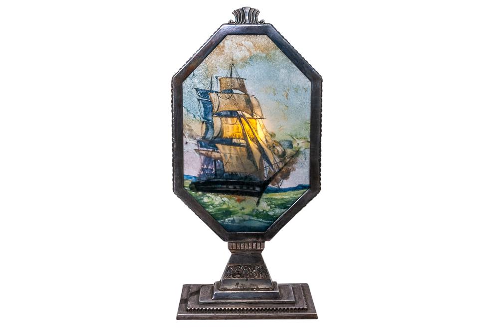PAIRPOINT RADIO LAMP YANKEE WHALER SHADE E3036: circa 1929-1930 painted "chipped ice" glass shade with a silverplate metal base shade depicting a Yankee whaler base signed lower Pairpoint E3036 13 1/2 total inches high; frame opening: 8 3/4 x 5 3/4
