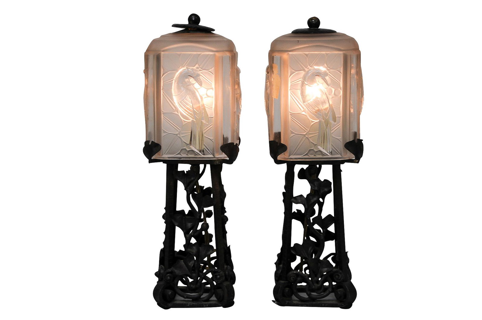 PAIR OF GLASS BIRD TABLE LAMPS: circa 1925-1950 frosted glass shades with pierced bronze bases Condition: with small nicks to lower rim of glass shades 13 1/2 inches total height; shade: 4 inches wide; 6 1/2 inches high