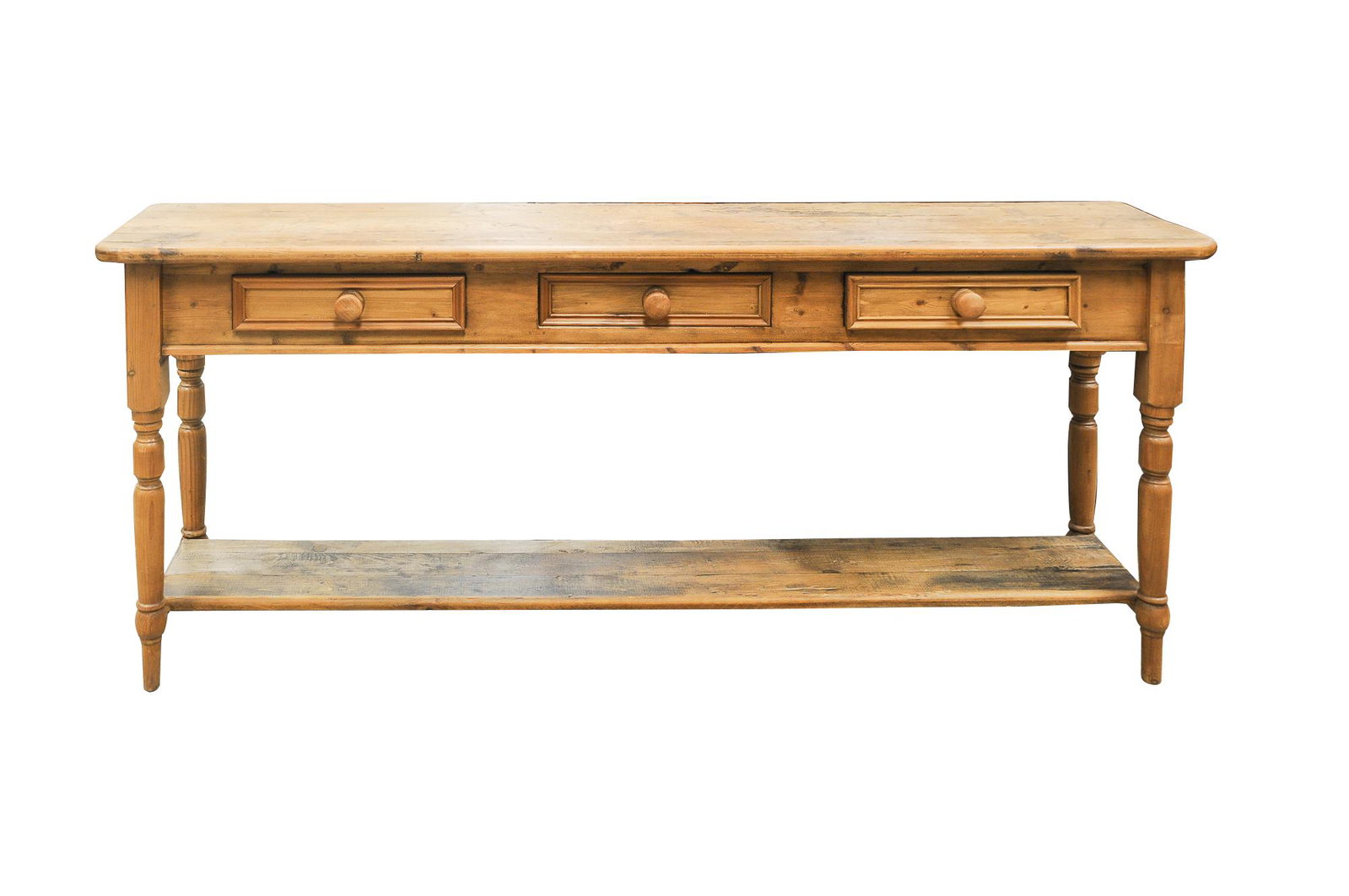 AMERICAN RUSTIC STYLE PINE SOFA TABLE: modern, with older top with three frieze drawers Condition: good; the top with extensive wear 72 inches wide; 15 inches deep; 30 inches high
