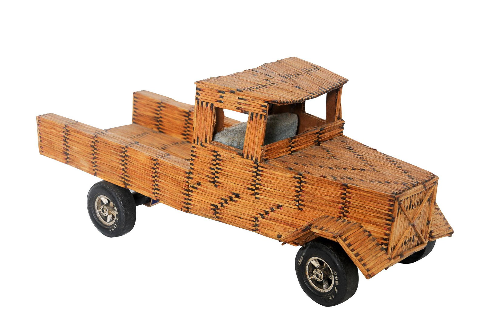 TRAMP ART TRUCK: circa 20th Century matches, cardboard and composition Condition: with slight loss to rear axle underside 16 inches wide