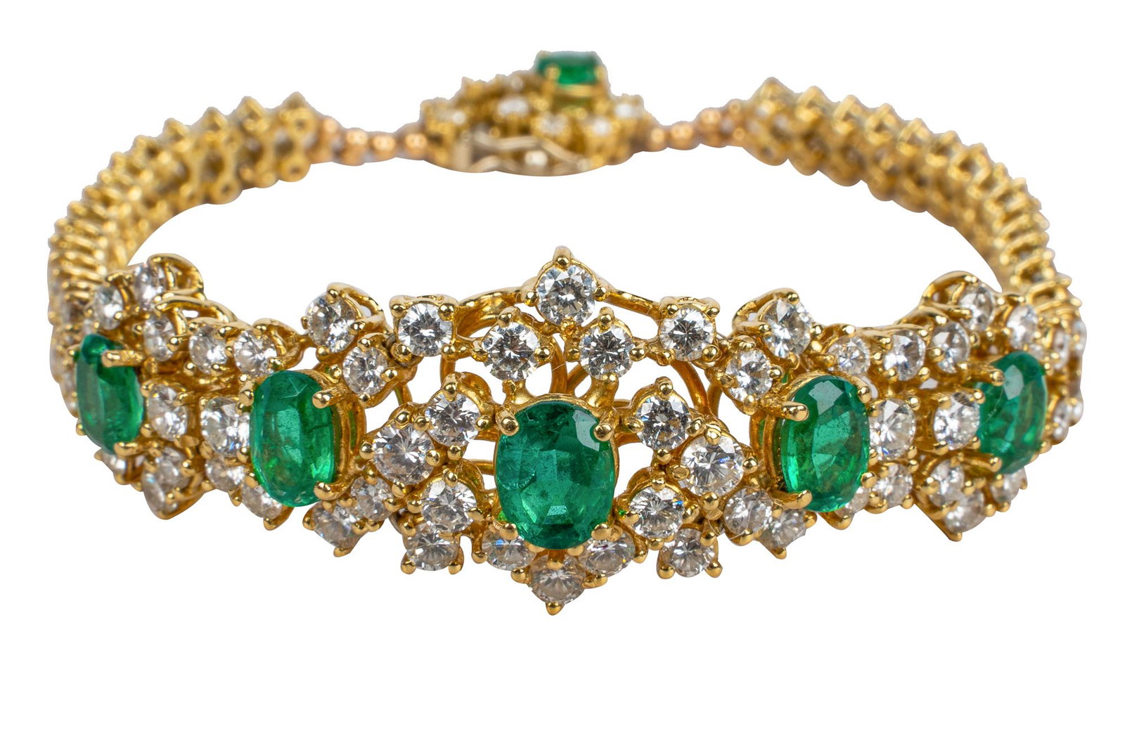 18 KARAT YELLOW GOLD, DIAMOND, & EMERALD BRACELET: containing five oval mixed cut emeralds weighing approximately 1.75 carats total, surrounded by full cut diamonds [G-I/VS2-SI1] weighing approximately 2.35 carats total 18.4 grams 7 1/4 inches long