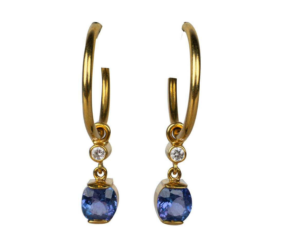 PAIR OF 22 KARAT, DIAMOND, & TANZANITE HOOP EARRINGS: containing two bezel set full cut diamonds [H-I/VS2-SI1] weighing approximately 0.20 carats total, and two oval cut tanzanite weighing approximately 2.70 carats total 8.8 grams