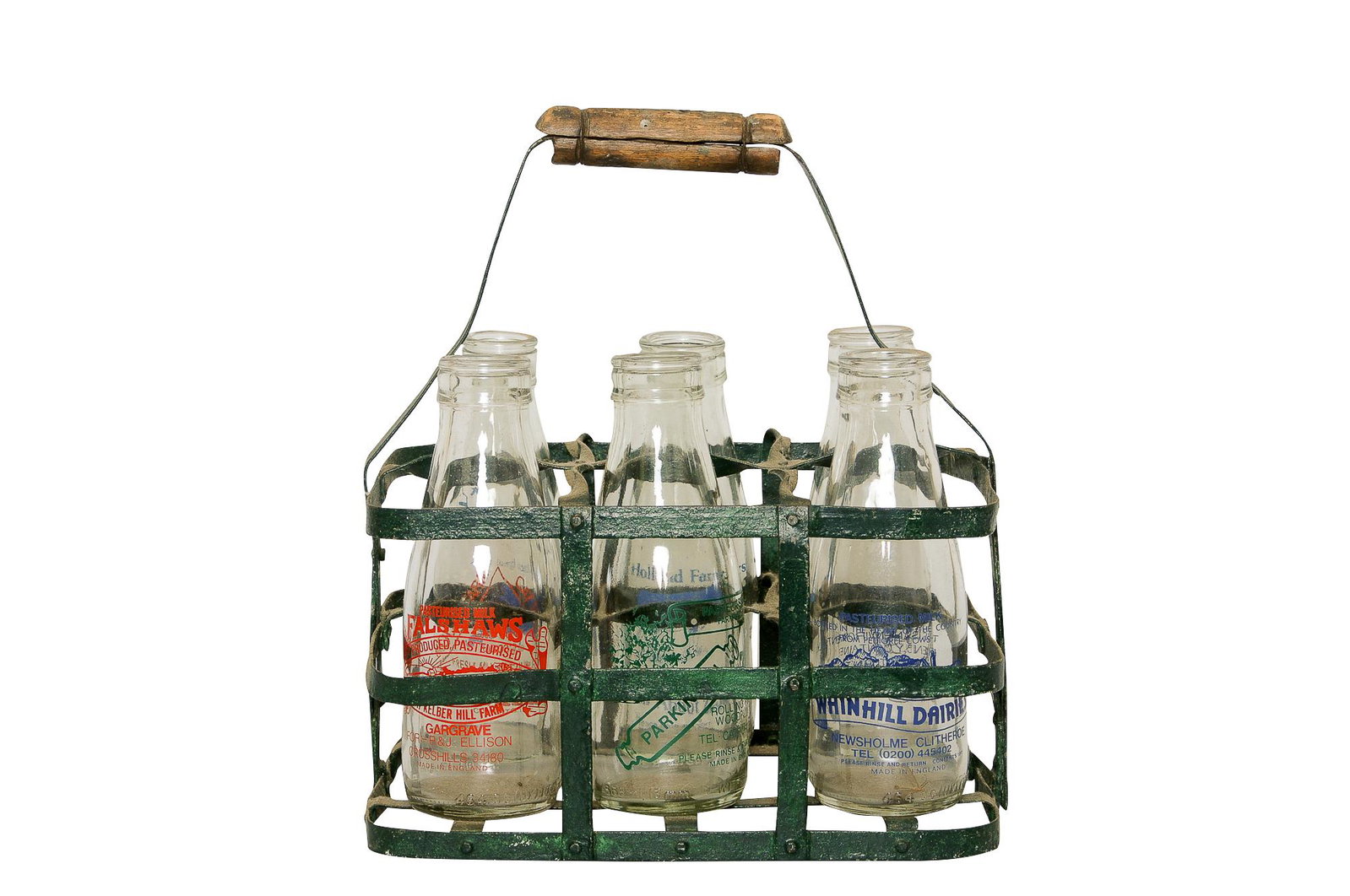 MILK CADDIE WITH BOTTLES: circa mid-20th Century metal, wood, and glass Condition: with separation to metal lower 12 inches wide; 7 inches deep; 14 inches high