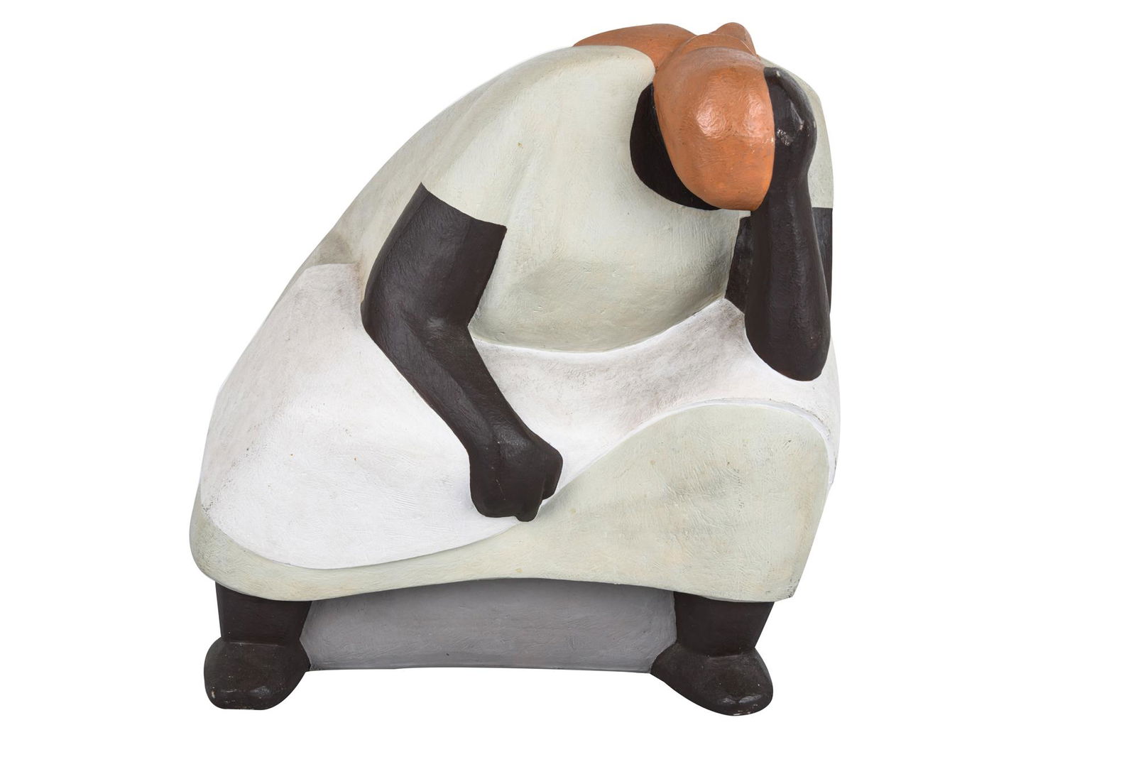 MARTIN LYNN: SCULPTURE OF A SEATED WOMAN: circa 1986 composition signed underside Condition: with paint loss on upper hand 11 1/2 inches wide; 10 inches deep; 13 inches high