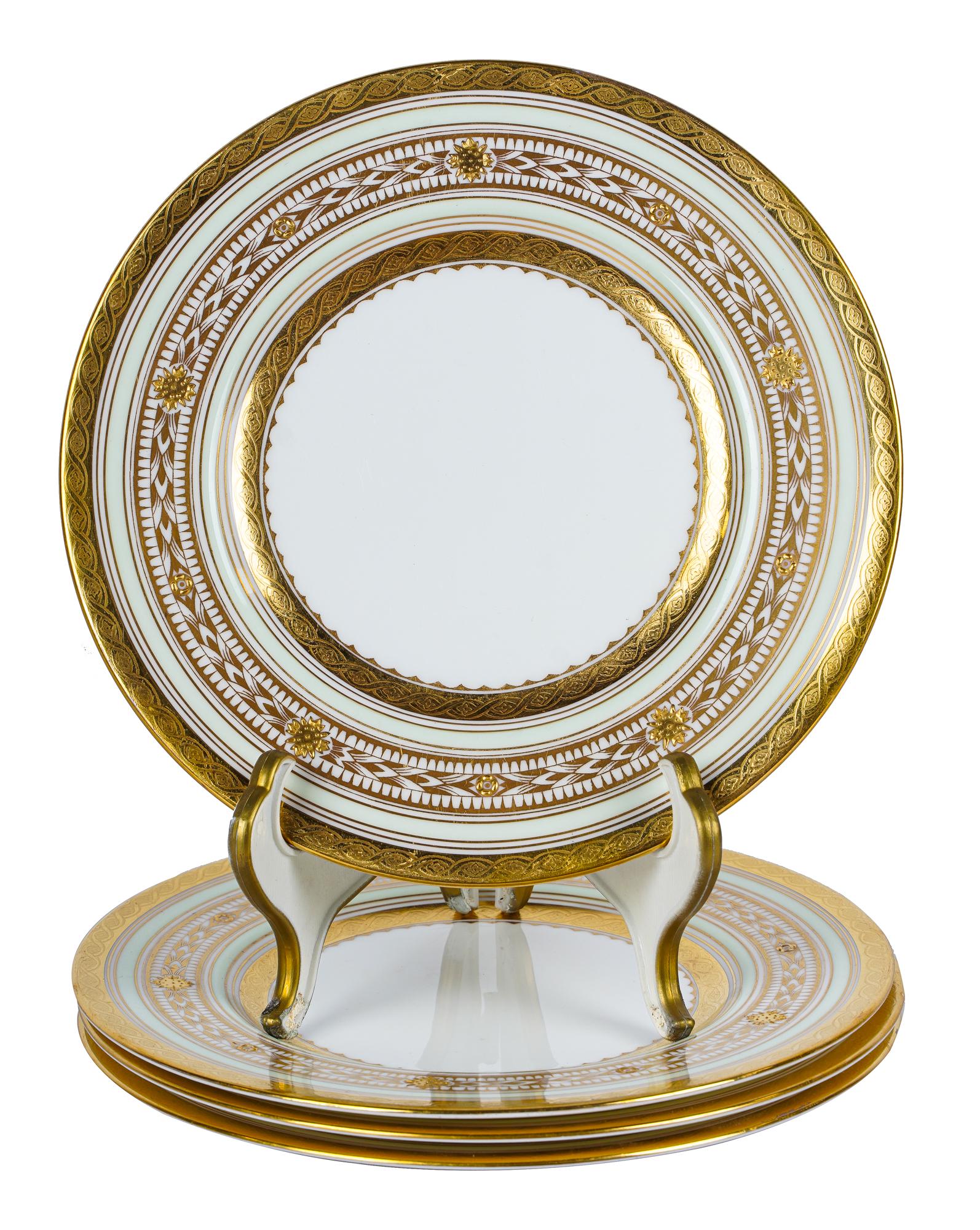 FOUR MINTON GILT & GREEN-ENAMELED PORCELAIN PLATES: with gilt Minton / Bone China / Made in England" mark and with retailer's mark "Tiffany & Co. / New York" [4 pieces] each 7 3/4 inches diameter