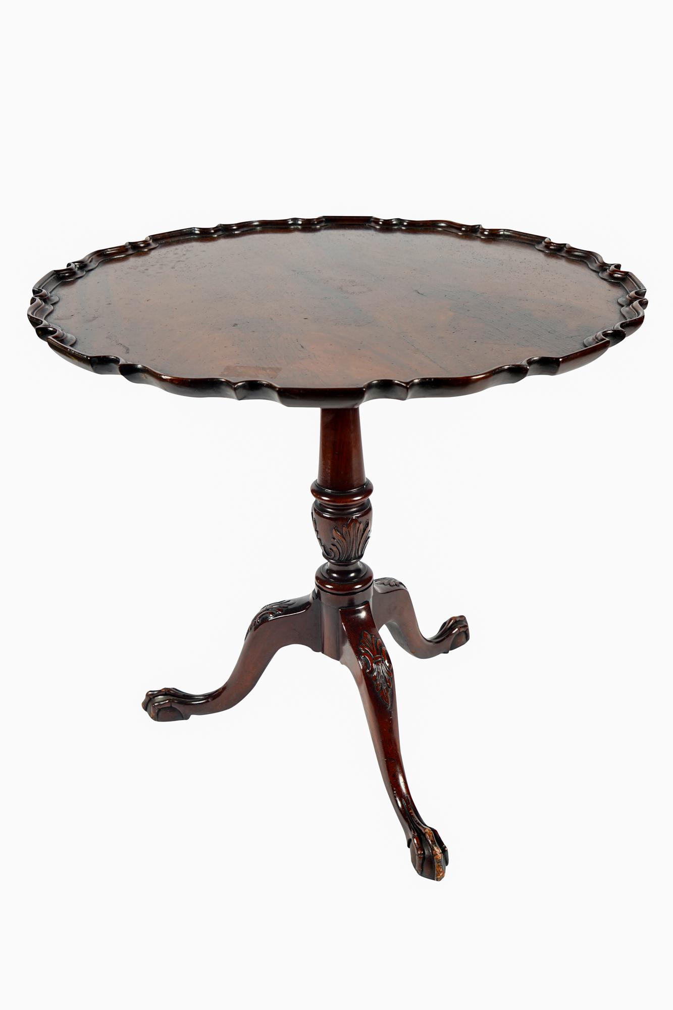 MAHOGANY PIE CRUST TILT-TOP TABLE: Condition: nicks and wear to feet. 29 inches diameter; 28 inches high