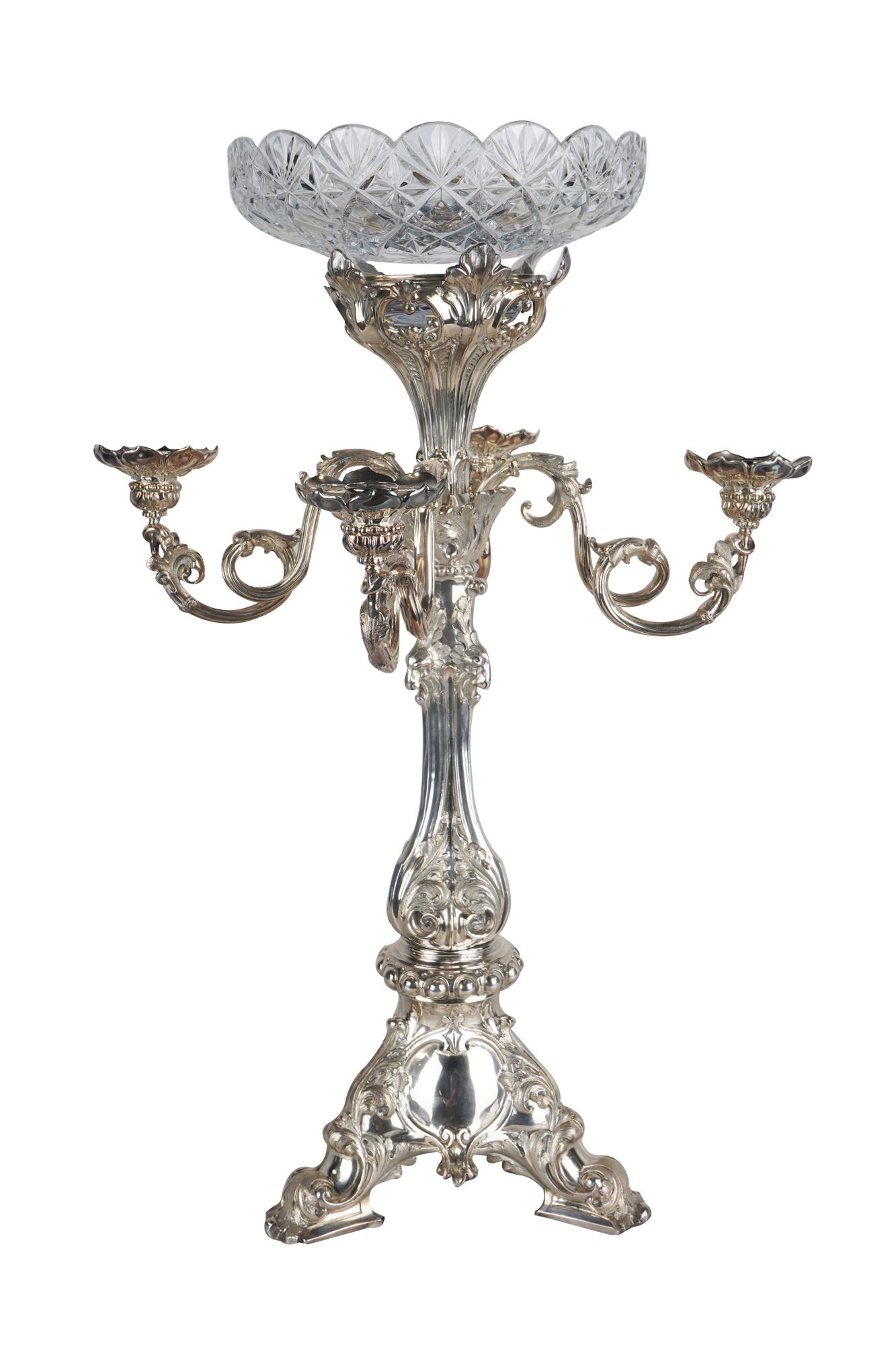 SILVERPLATE & CUT-GLASS EPERGNE: with four detachable candle arms, the base engraved with an armorial crest 17 1/2 inches diameter; 26 inches high