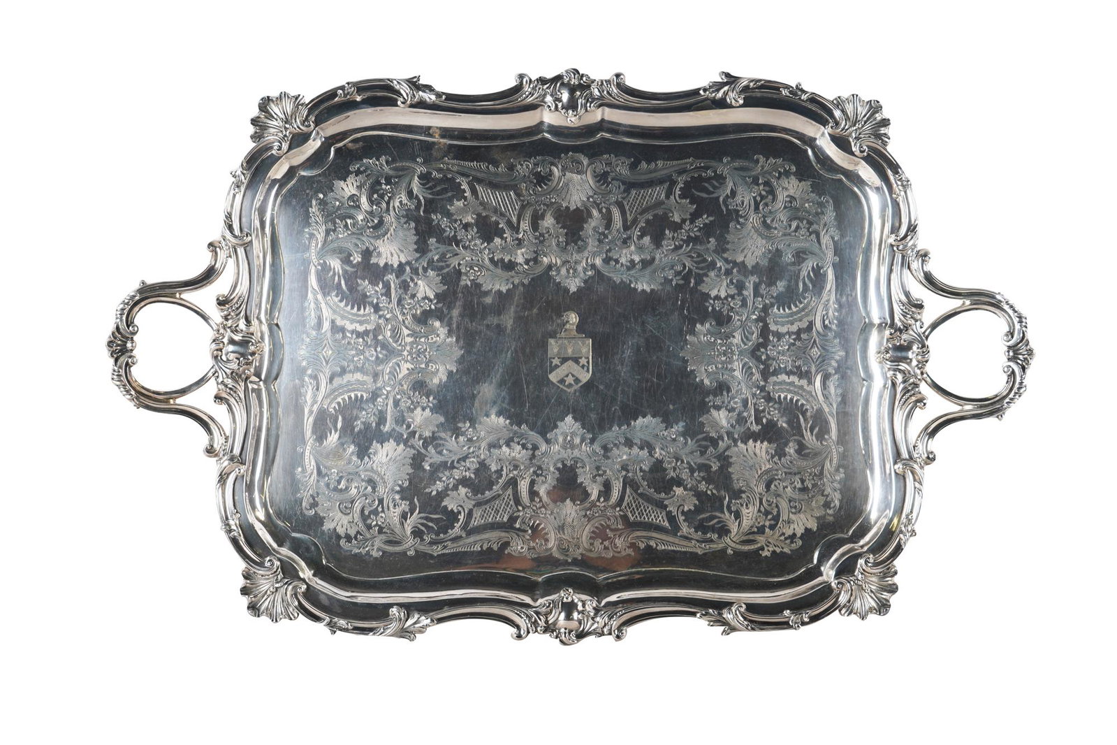 VICTORIAN SHEFFIELD PLATE BUTLER'S TRAY: 19th century, mark of Roberts, Cadman and Co., Sheffield, England, with scrolls and foliage centered by an armorial crest Condition: scratches throughout each side. A few spots of minor oxidation. 36 