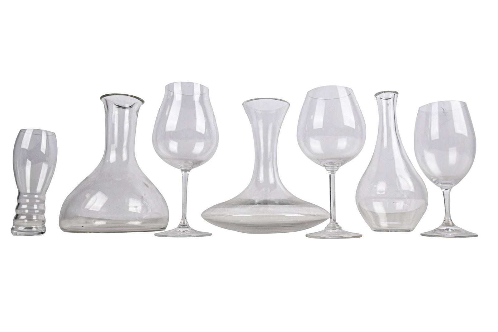 ASSEMBLED SET OF RIEDEL STEMWARE & DECANTERS: comprising three beveled lip wine glasses (9 1/2 inches high); 13 large wine glasses (9 inches high); three wine glasses (8 1/4 inches high); six wine glasses (7 1/2 inches high); five glasses (6 inch