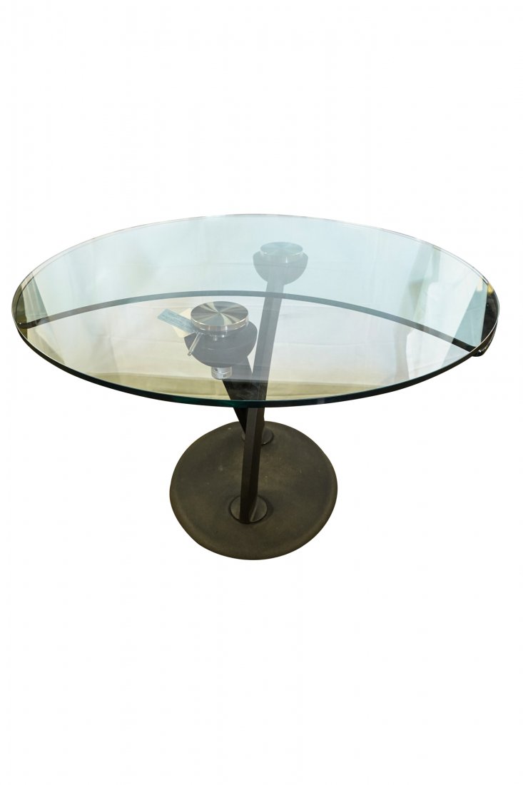 ARNALDO GAMBA FOR NAOS: "HULA OP DINING TABLE": with two fixed glass pieces; round center table in closed position, opening to an elongated dining table Condition: with lever to adjust mechanism closed: 47 1/4 inches diameter; 29 inches high; open: