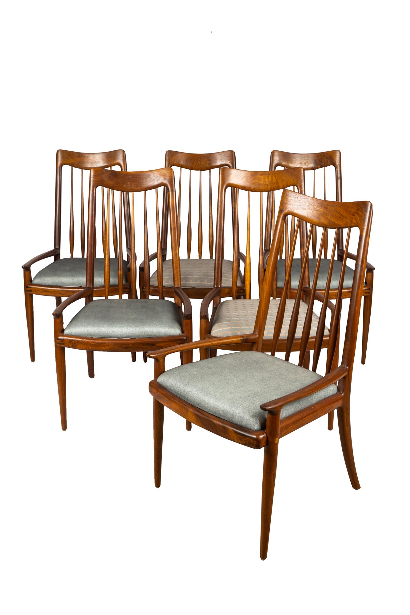 SAM MALOOF (1916 - 2009): TWELVE WALNUT DINING CHAIRS (1 of 7)