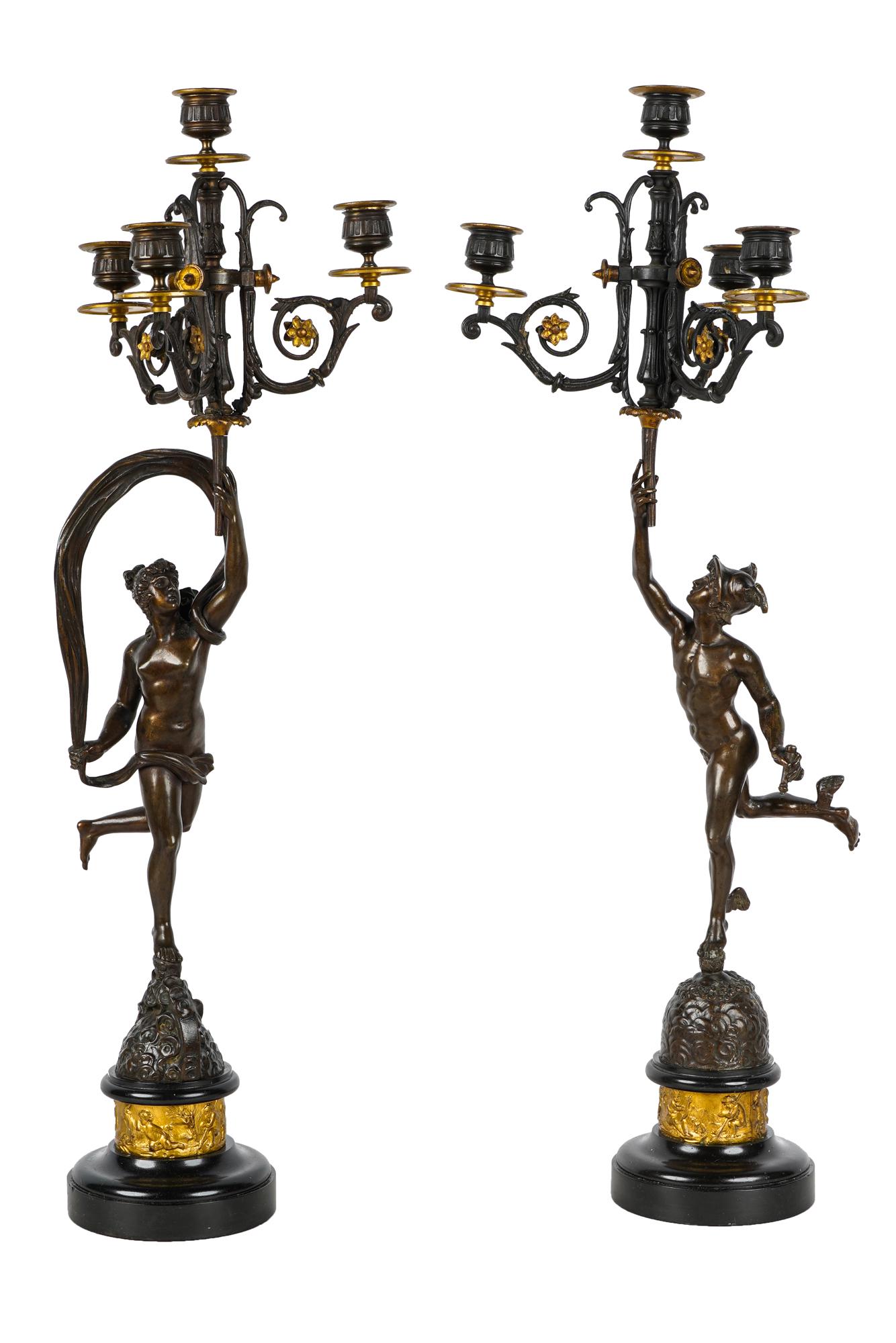 PAIR OF BRONZE FOUR-LIGHT CANDELABRA: each on a marble base each: 27 inches high
