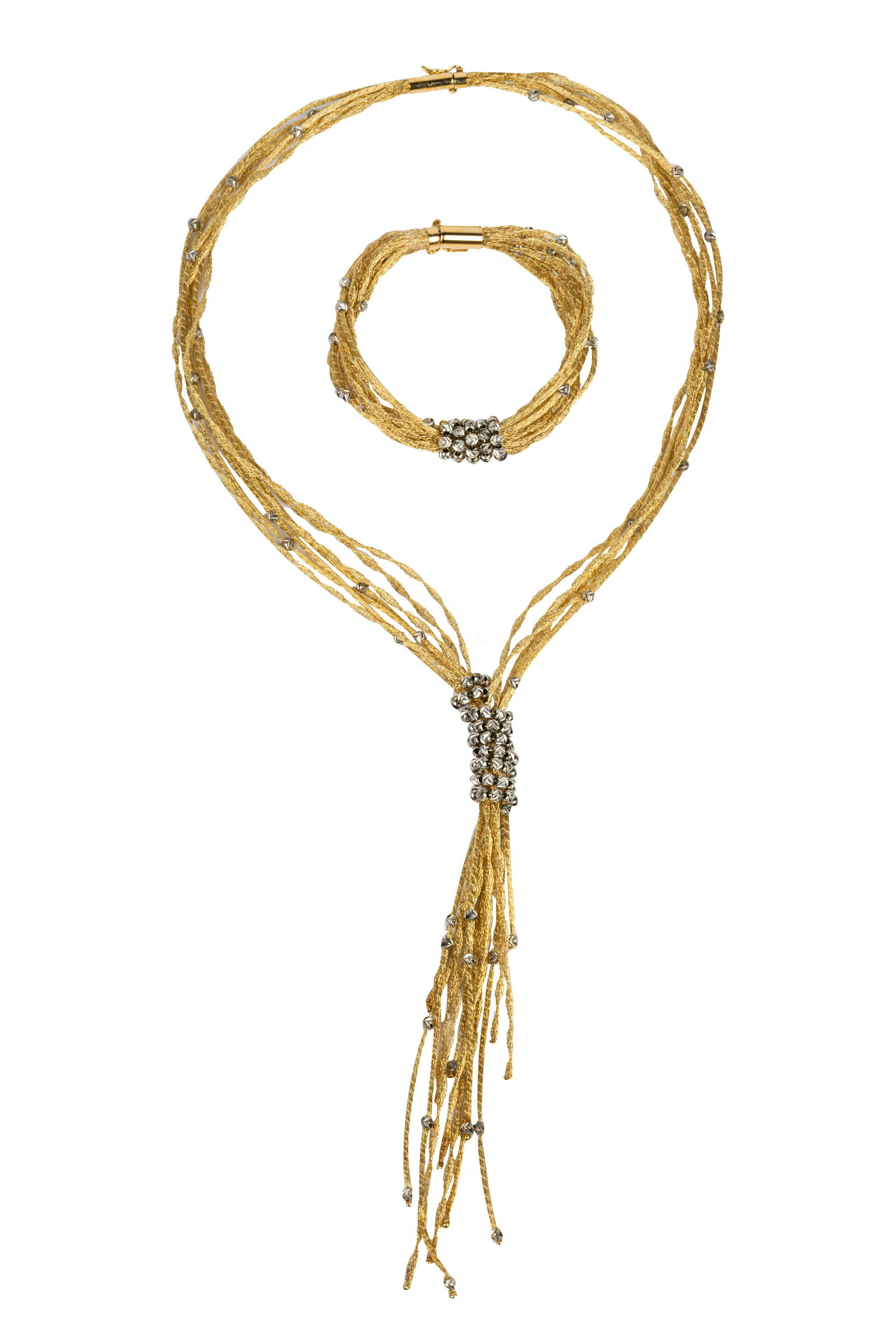 14 KARAT GOLD JEWELRY SUITE: comprising a necklace and bracelet 45.0 grams total the bracelet: 7 inches long; the necklace: 16 1/2 inches long with 5 inch tassel