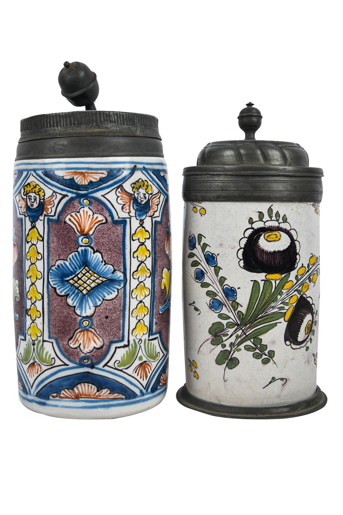 TWO FAIENCE TANKARDS (1 of 10)