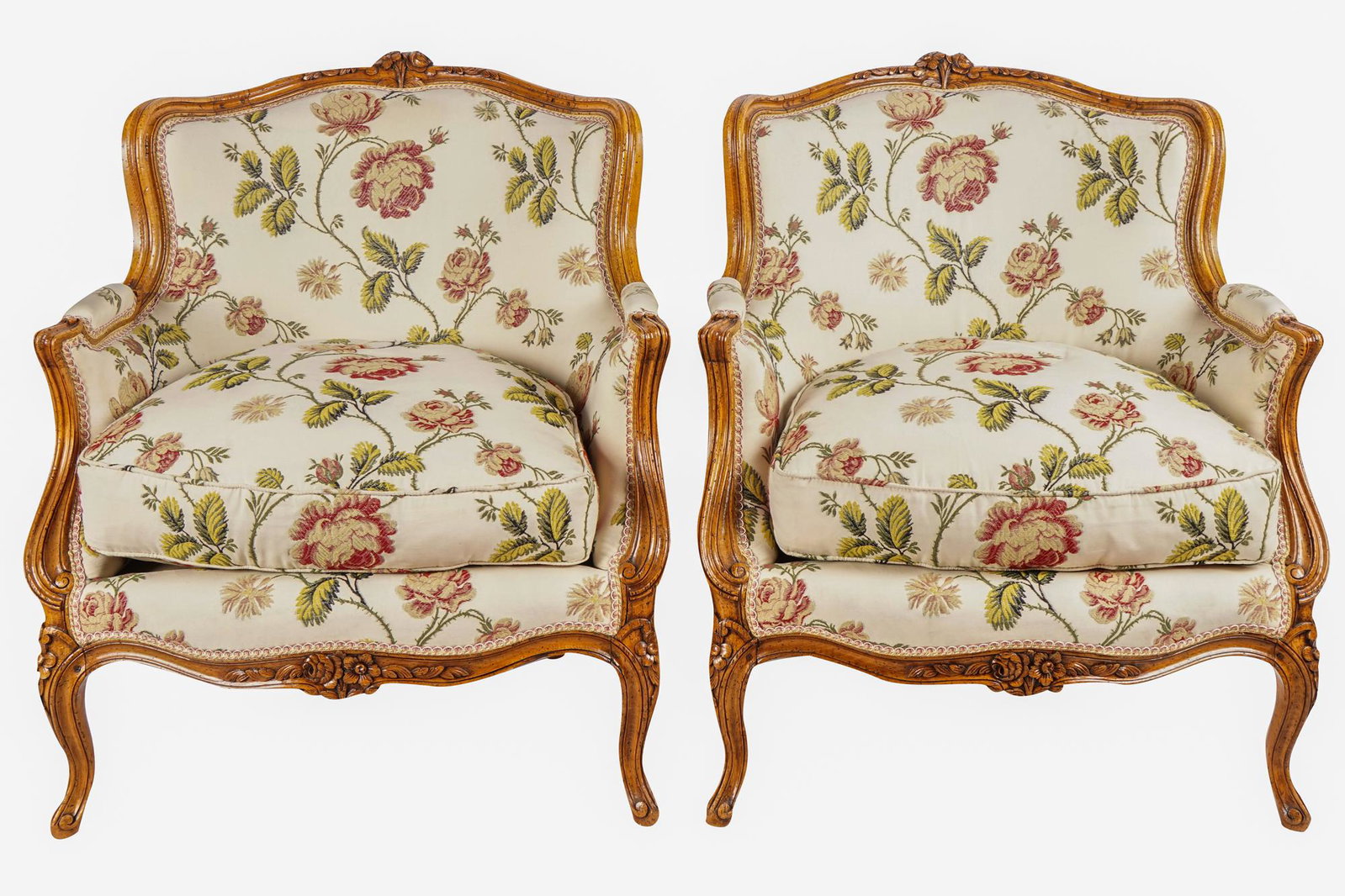 PAIR OF LOUIS XV CARVED FRUITWOOD BERGERES: Condition: upholstery appears to be clean and in good condition 28 inches wide; 29 inches deep; 33 inches high