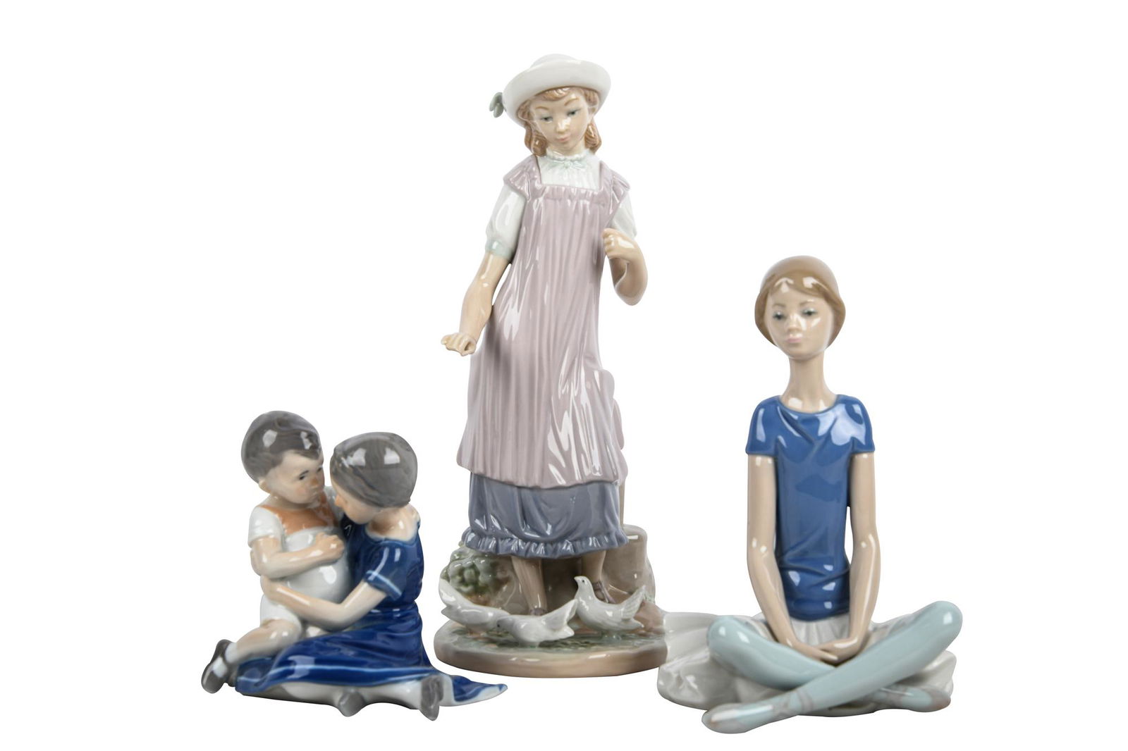 THREE PORCELAIN FIGURES (1 of 12)