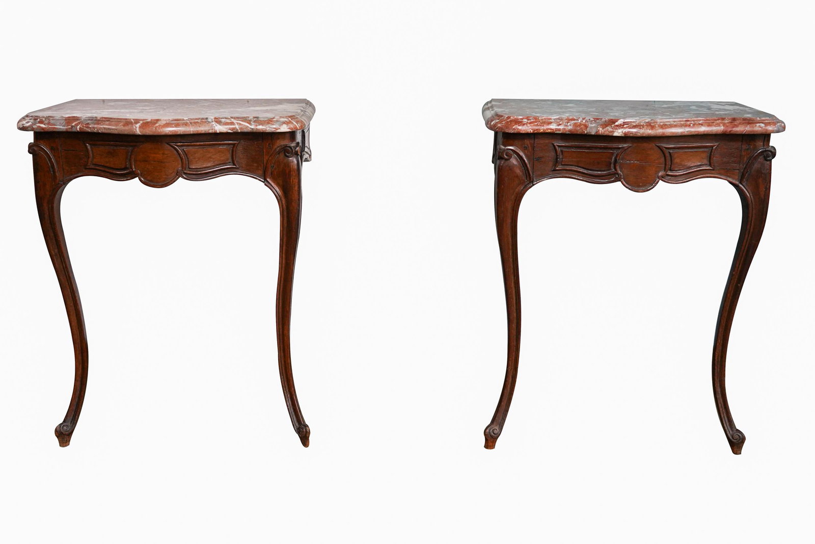PAIR OF CARVED WALNUT MARBLE-TOP CONSOLES: with cabriole legs 24 inches wide; 15 1/2 inches deep; 29 1/2 inches high