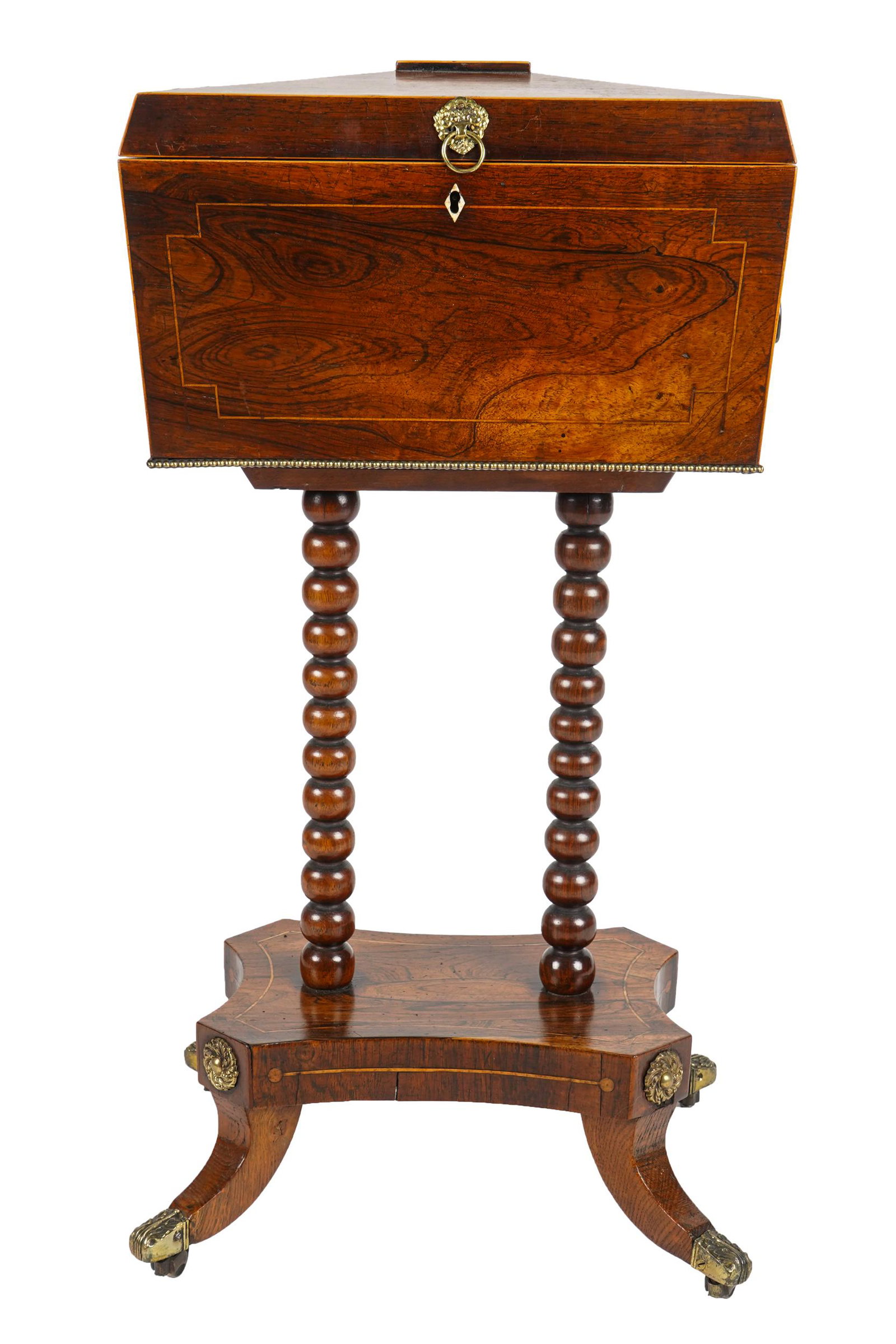 EDWARDIAN MAHOGANY TEAPOY: hinged top revealing four compartments and three lids 15 inches wide; 8 1/2 inches deep; 29 inches high