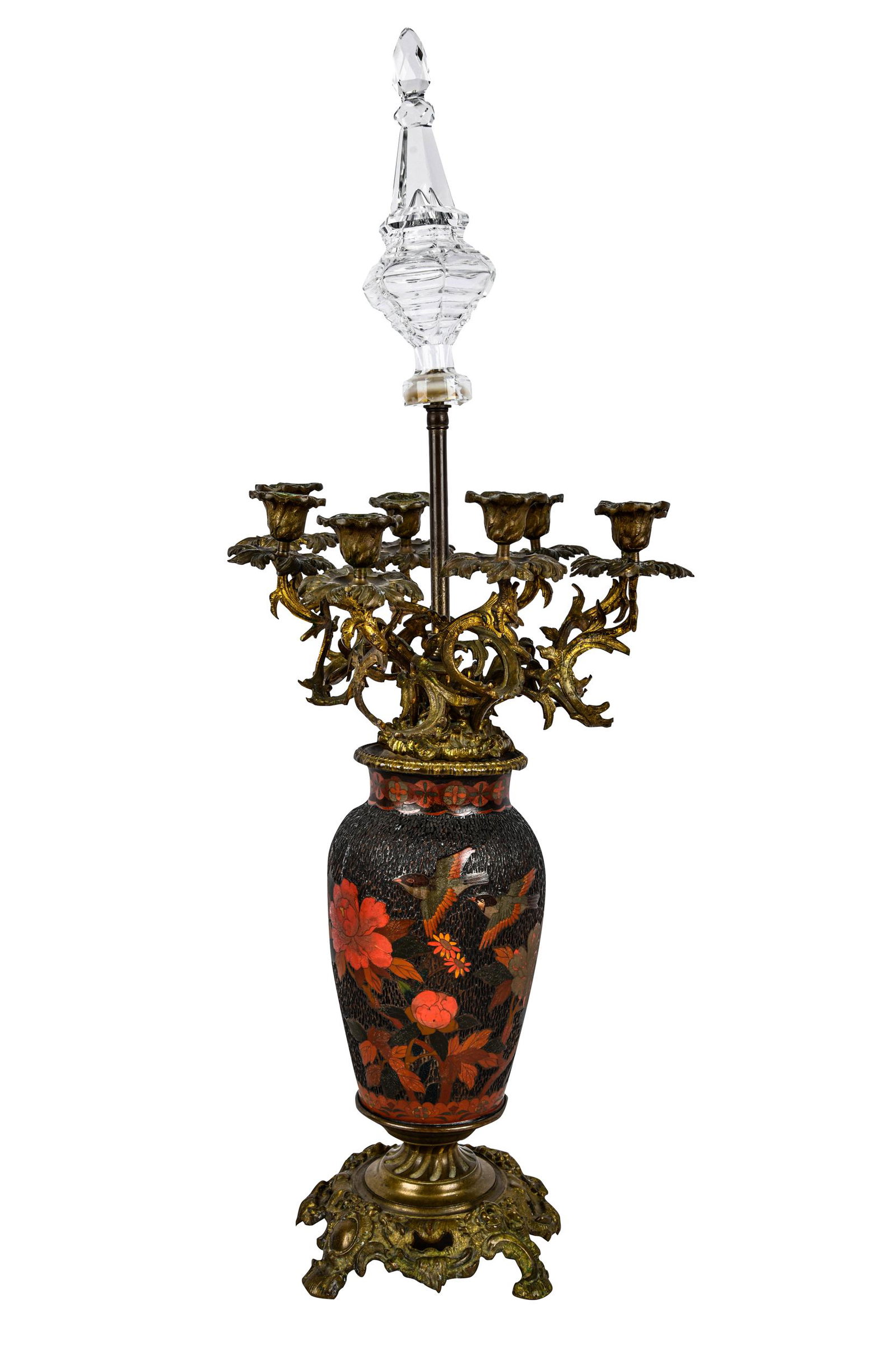 GILT MOUNTED LACQUERED URN CANDELABRA: Chinoiserie lacquered urn mounted on a gilt bronze base with gilt metal candelabra arms and an added crystal finial Condition: with loss to lacquer 33 inches high