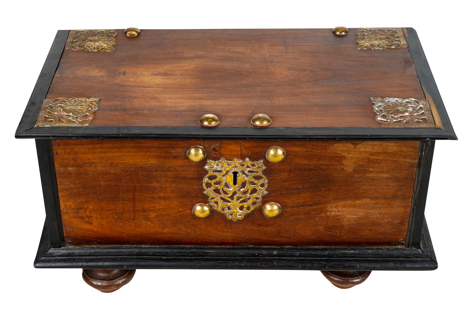 BRASS-MOUNTED MAHOGANY CHEST: the hinged top enclosing an interior with a suspended, lidded compartment; raised on four feet, with key Condition: some indentations to copper knobs. One handle with one broken attachment. 33 inches 