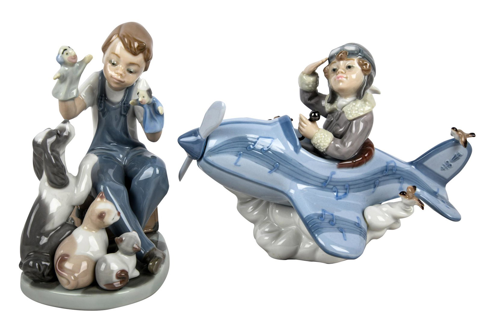 TWO LLADRO FIGURES "OVER THE CLOUDS" & "PUPPET SHOW": each with original boxes puppet show: 5 inches high