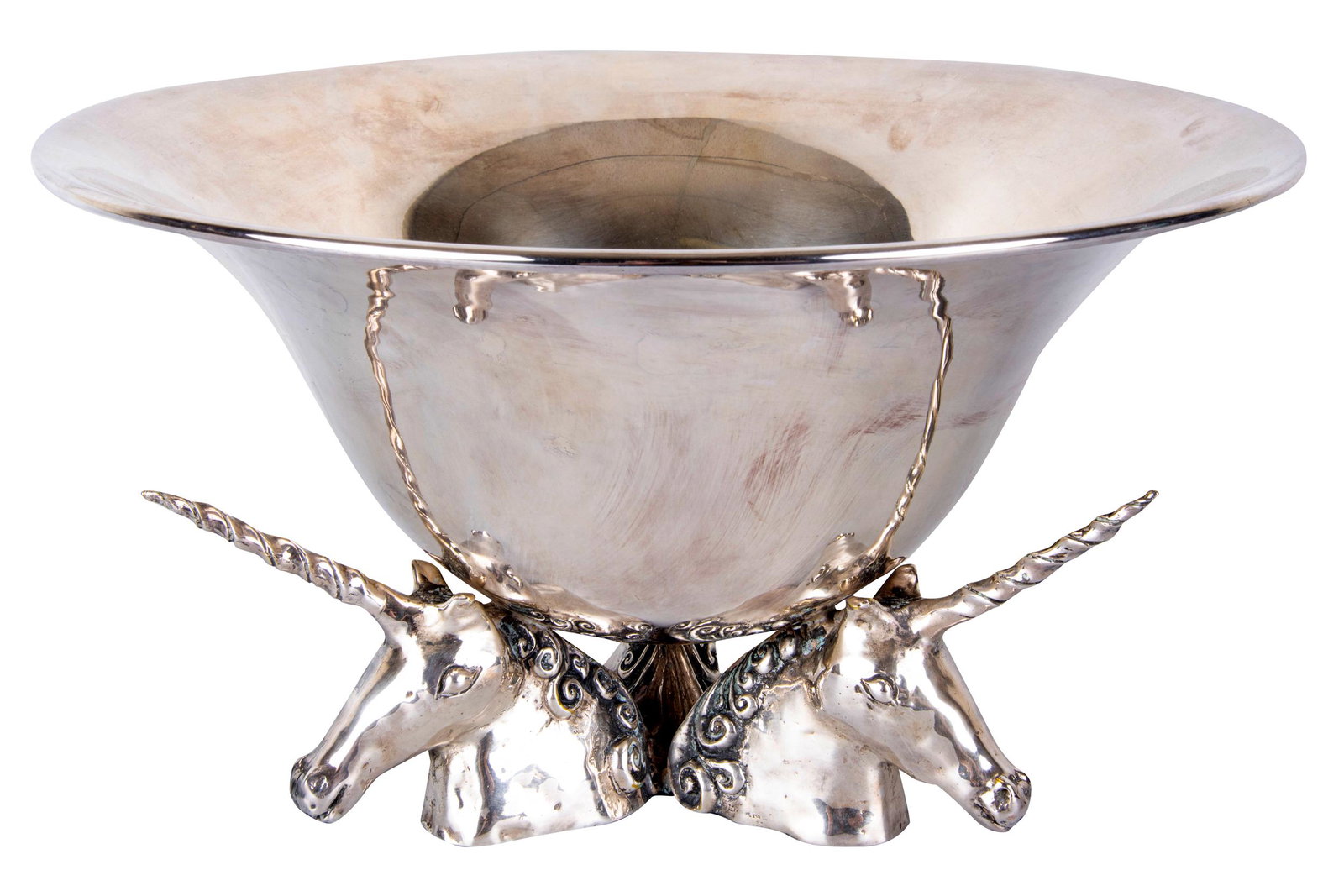 JEAN BOGGIO "LICORNE" SILVERPLATE PUNCH BOWL: 1992 the bowl supported by three unicorn heads each of the unicorns is variously marked 'Jean Boggio,' 'Licorne' and '1992.' Note: Silverplate and other metal decorative arts designed by Jean Boggio a