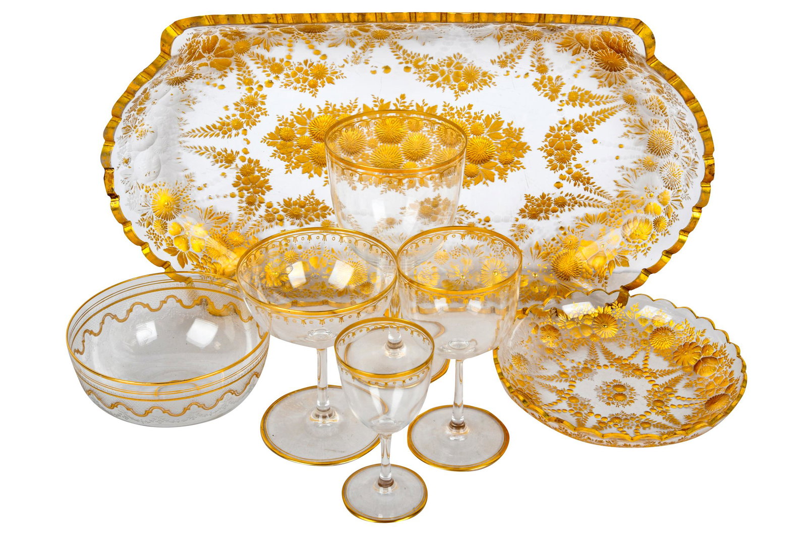 ASSEMBLED SET OF GILT-DECORATED GLASSWARE: unmarked, comprising 10 port glasses (4 inches high); 11 champagne coupes (4 1/4 inches high); three wine glasses (4 3/4 inches high); 11 wine glasses (6 1/4 inches high); 11 finger bowls (4 3/4 inche