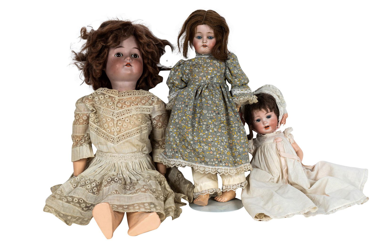 THREE ASSORTED PORCELAIN HEAD DOLLS (1 of 7)