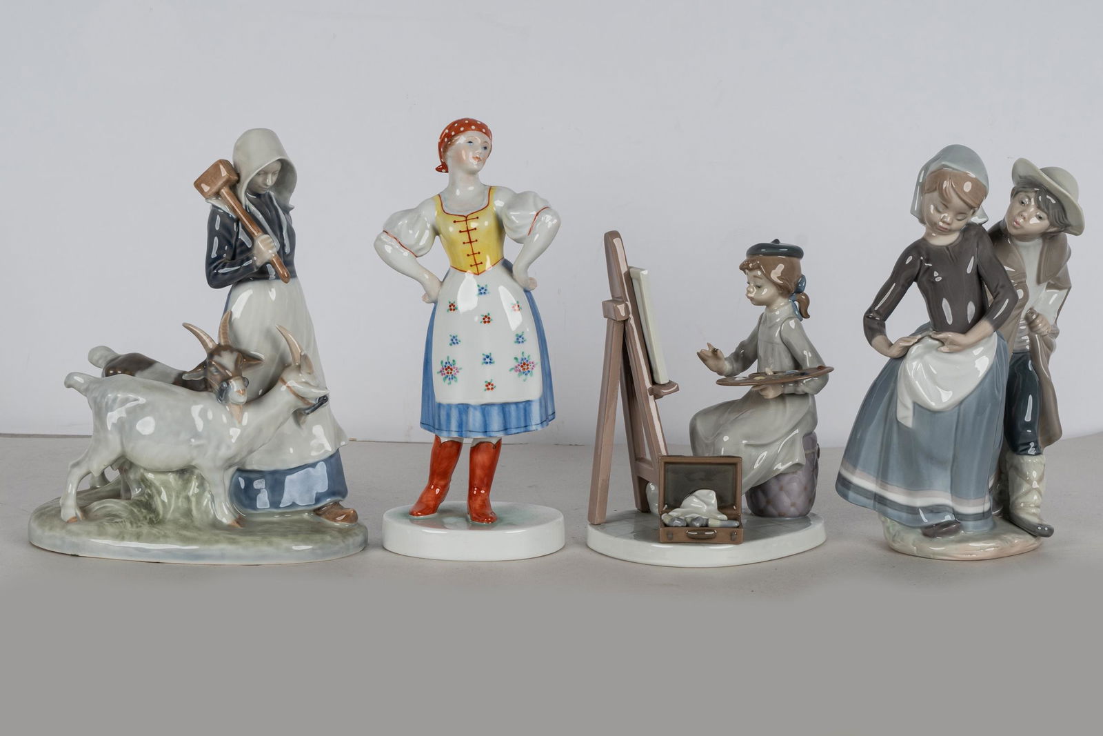 FOUR PORCELAIN GROUPS (1 of 13)