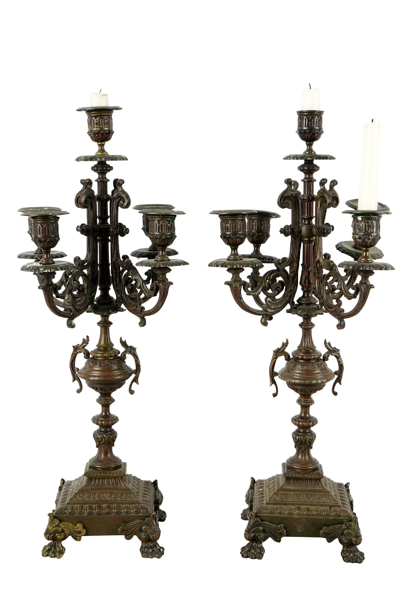 PAIR OF BRONZE CANDELABRA: five-light Condition: with wax residue throughout 20 inches high