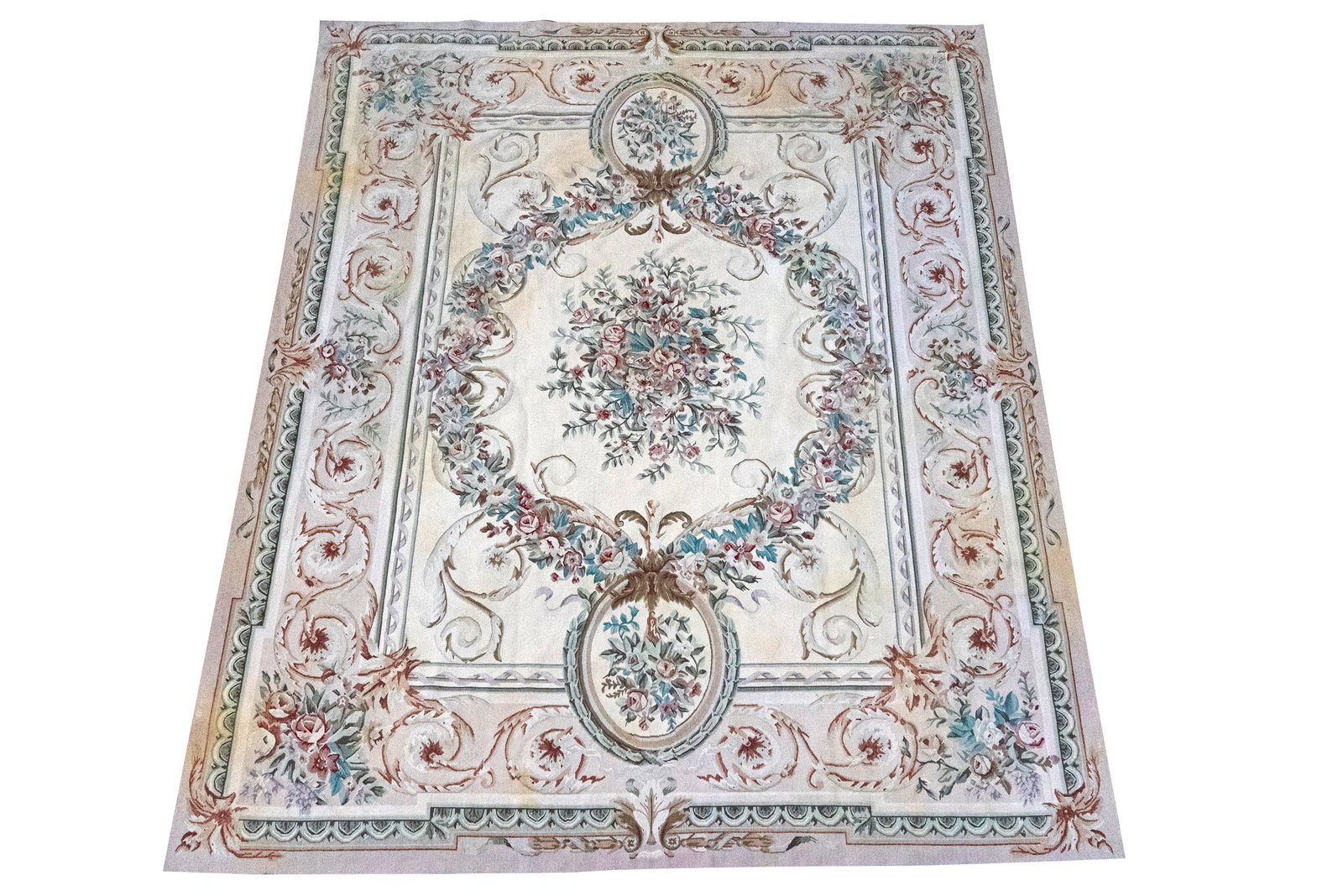 FLORAL CARPET: in the Aubusson tapestry style Condition: with areas of discoloration/stains; needs cleaning 10'2" x 8'