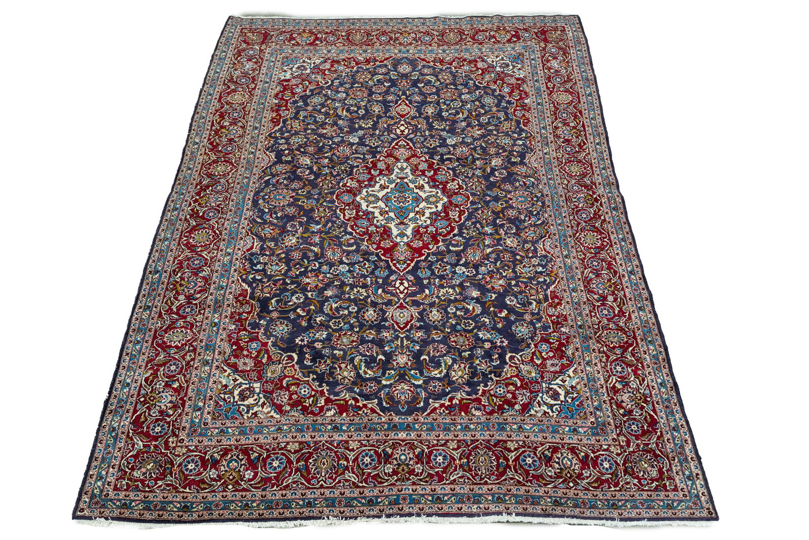 PERSIAN AREA RUG: with a central medallion 13'9" x 9'9"