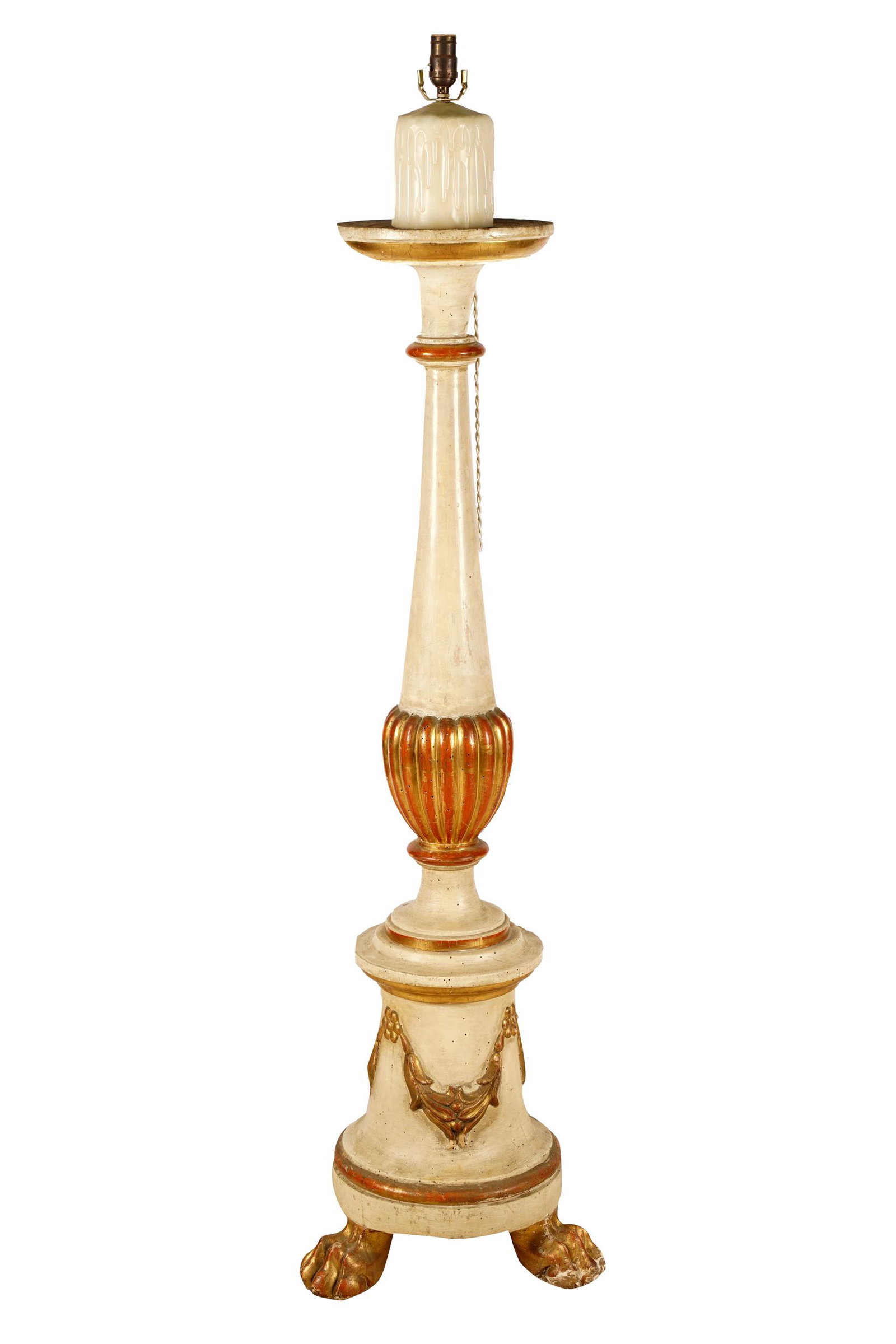 GILT & WHITE-PAINTED WOOD TORCHIERE: electrified, on three claw feet Condition: with losses to paint. Wear to feet. Working condition unknown. 14 inches wide; 62 3/4 inches high to top of cup